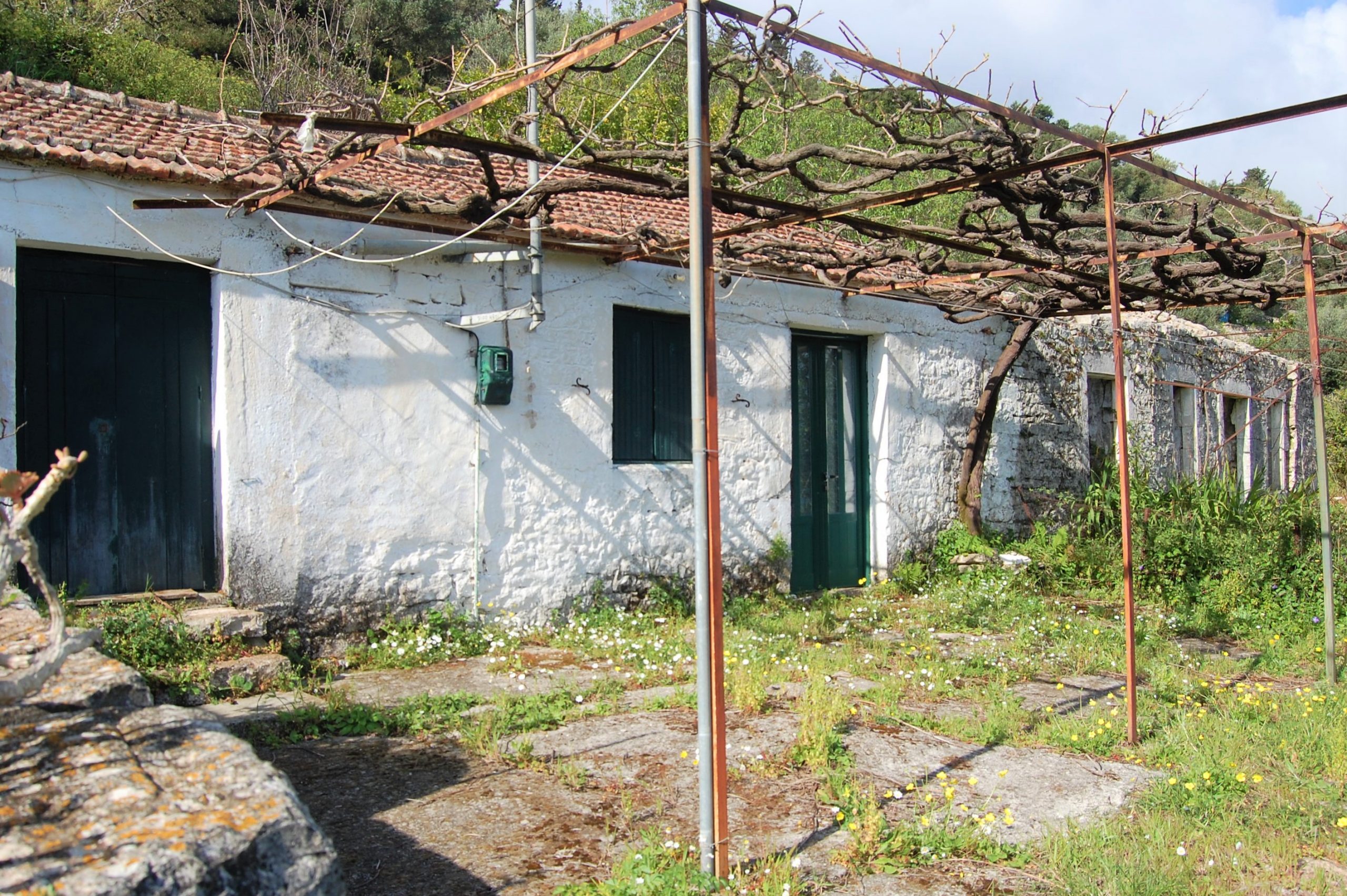 Front terrace and exterior facade of house for sale in ithaca Greece, Rachi