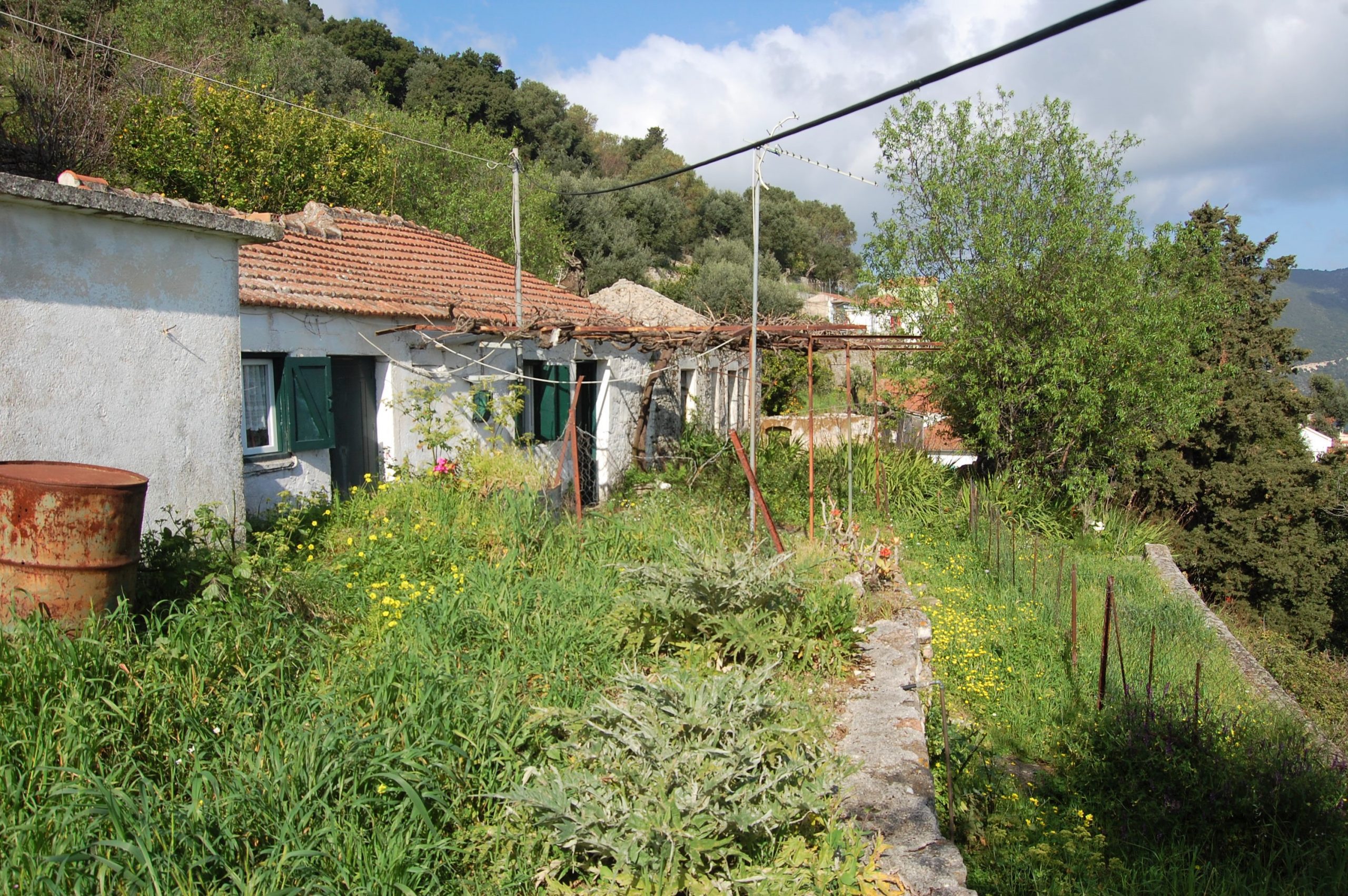 Front terrace and exterior facade of house for sale in ithaca Greece, Rachi