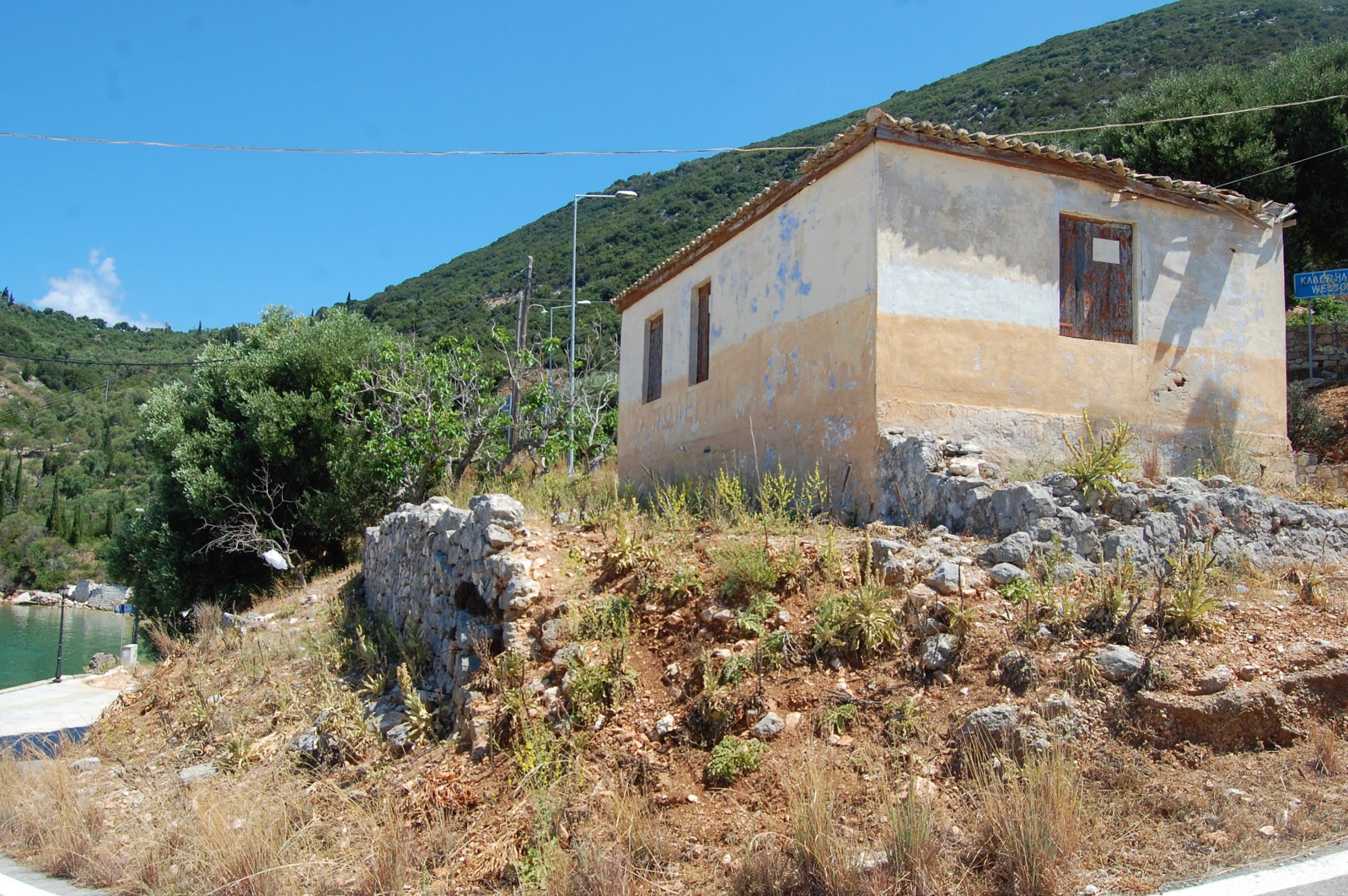 Distant view of house for sale on Ithaca Greece, Piso Aetos