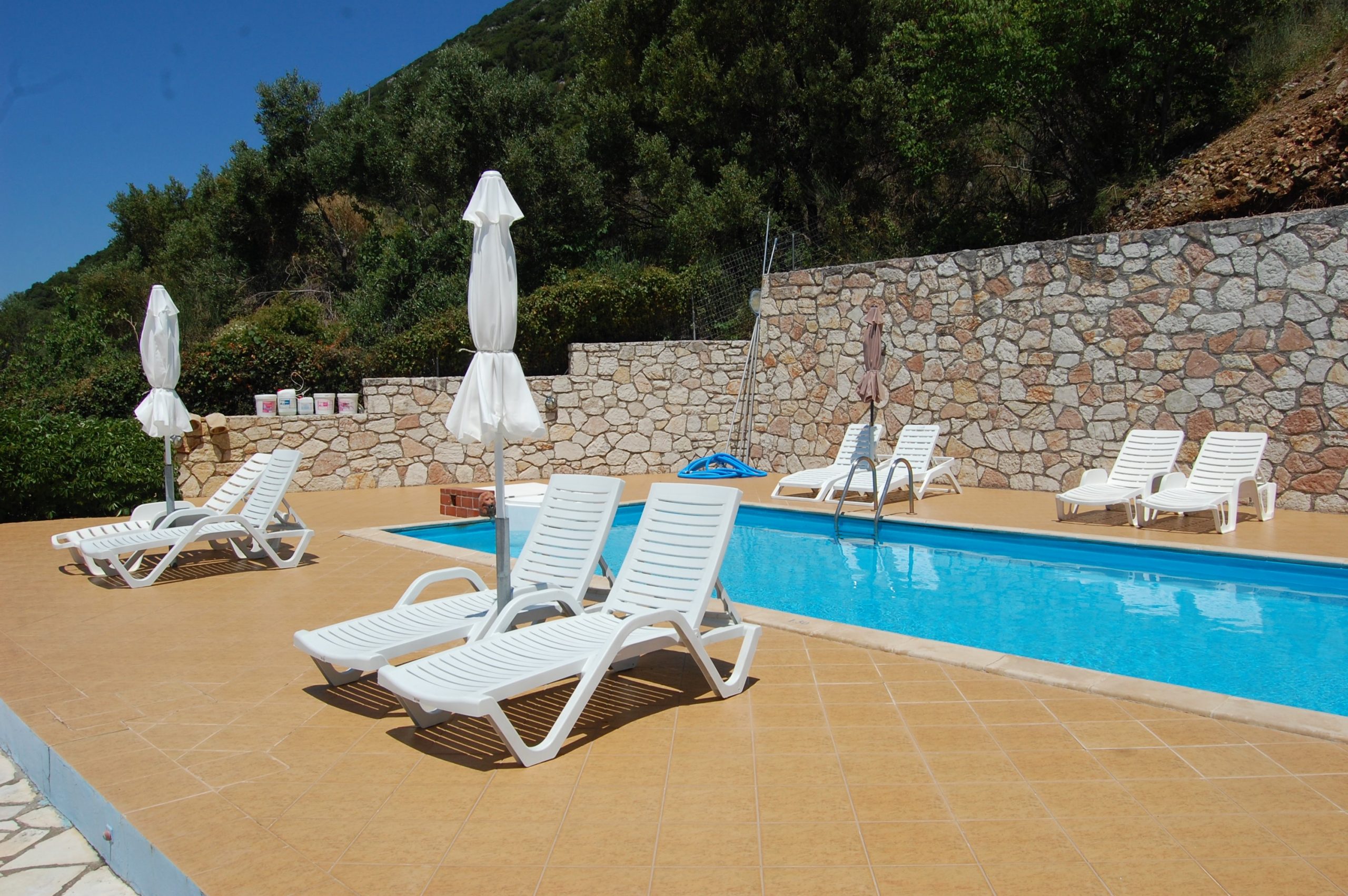 Outdoor area with a pool of property for sale on Ithaca Greece, Stavros