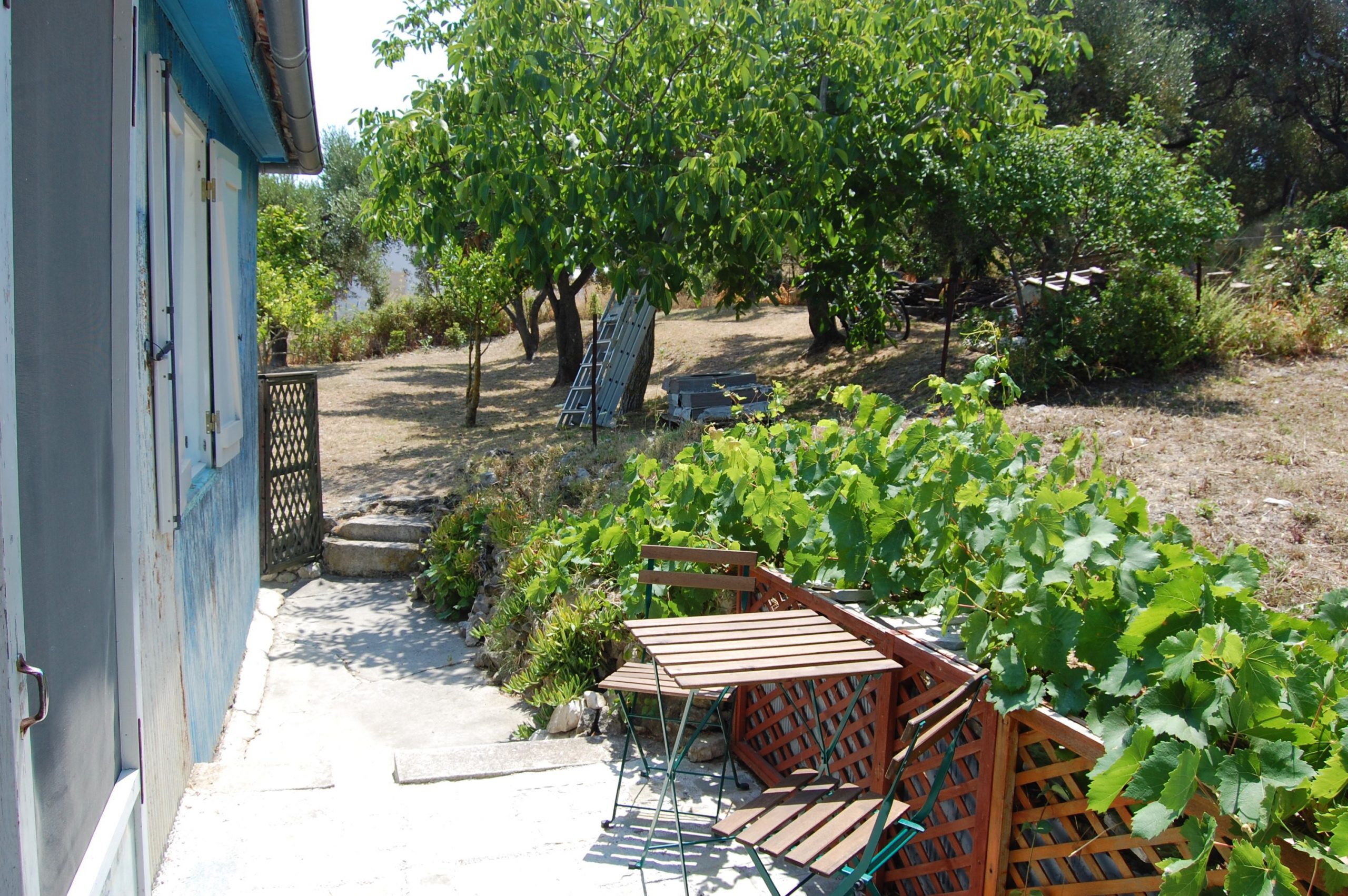Side terrace and garden of house for sale in Ithaca Greece,Ag Saranta