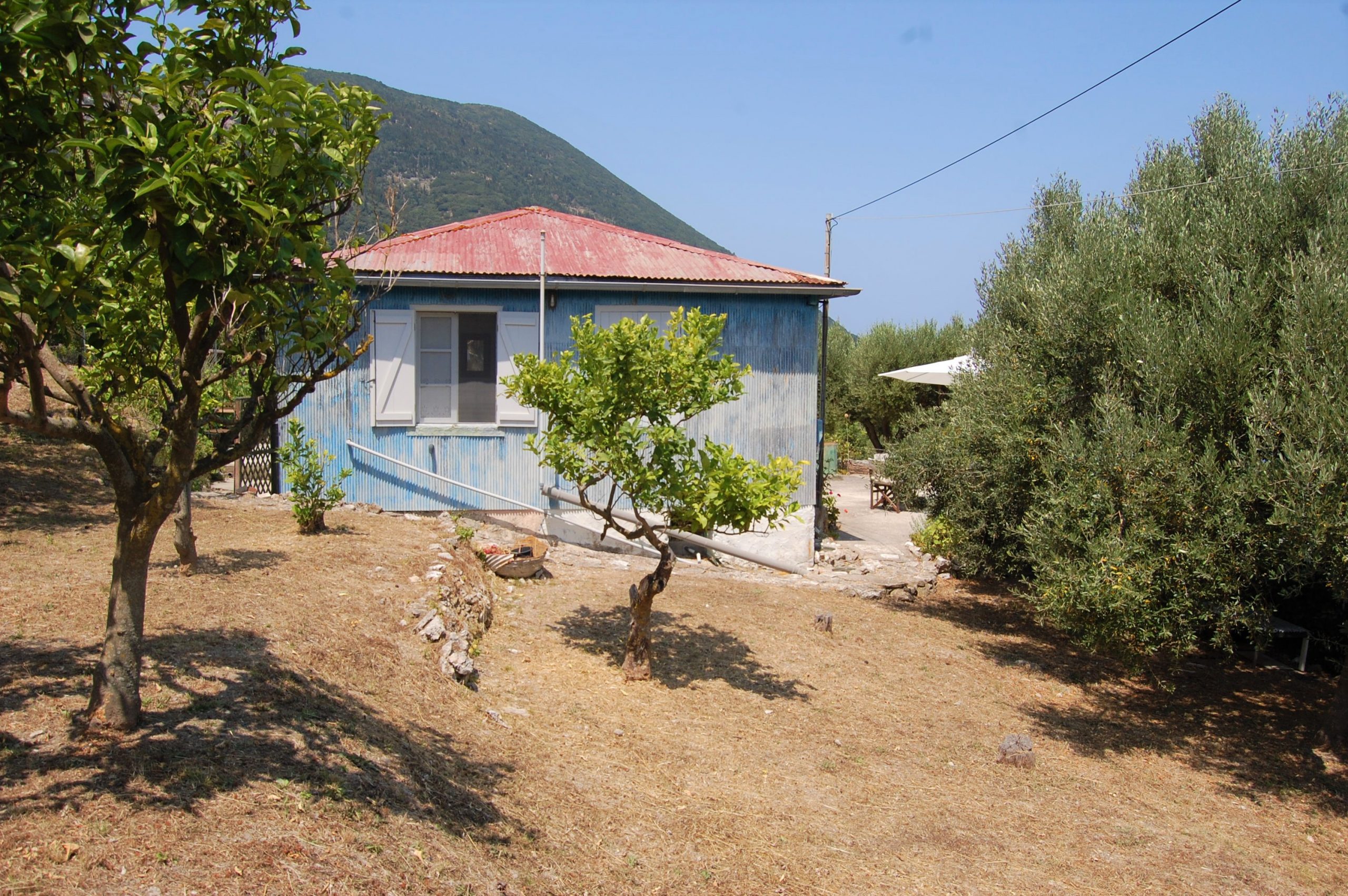 Side garden of house for sale in Ithaca Greece,Ag Saranta