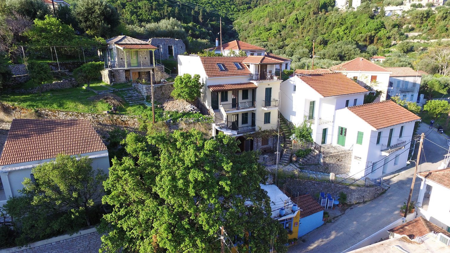 Aerial views of apartment complex and house for sale in Ithaca Greece, Kioni