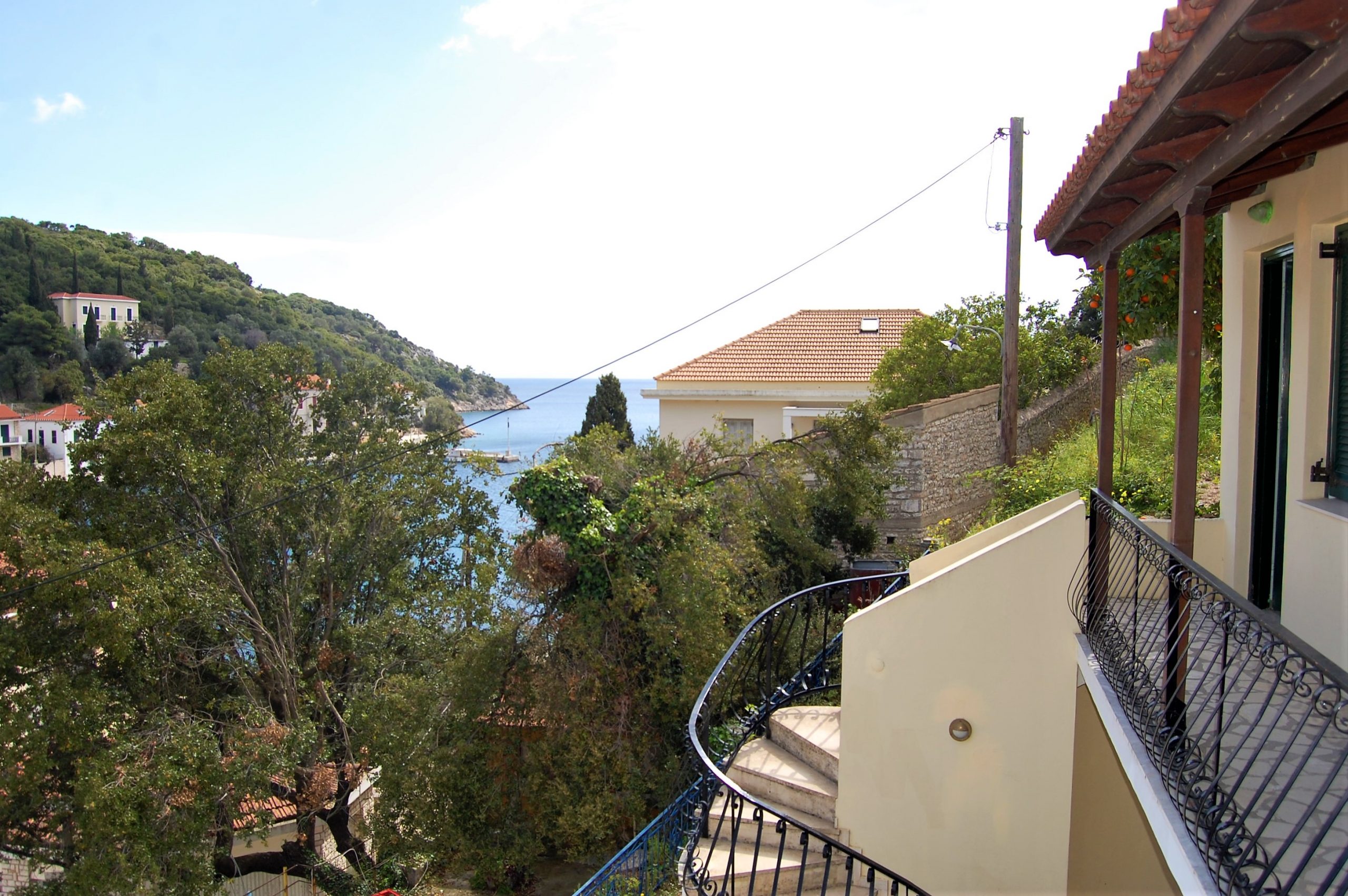 Balcony views of apartment complex and house for sale in Ithaca Greece, Kioni