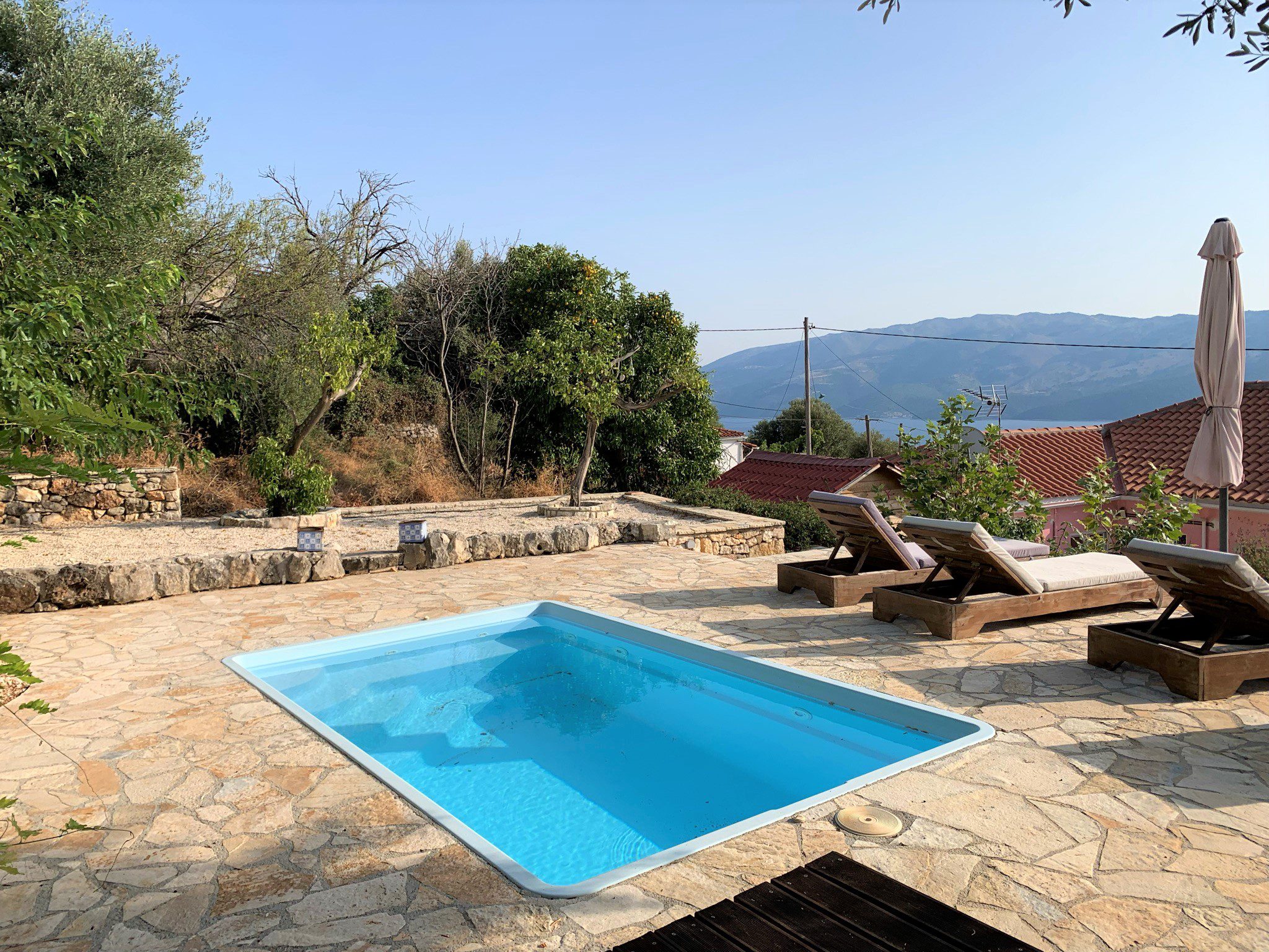 Swimming pool of house for sale in Ithaca Greece, Lefki