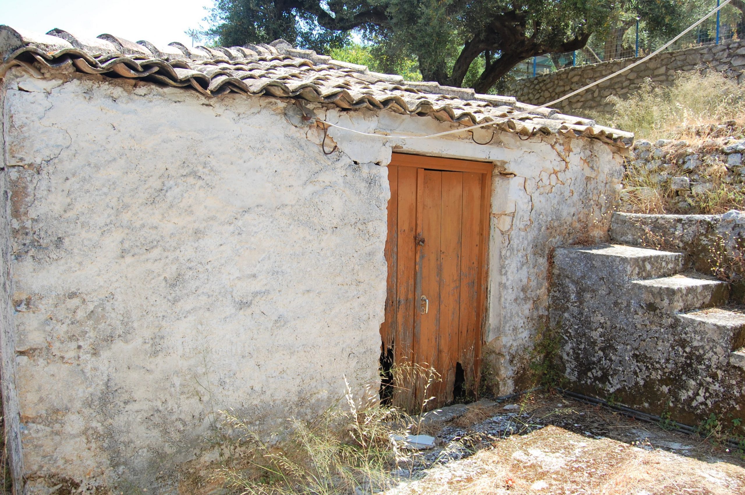 Outside building of house for sale in Ithaca Greece, Perachori