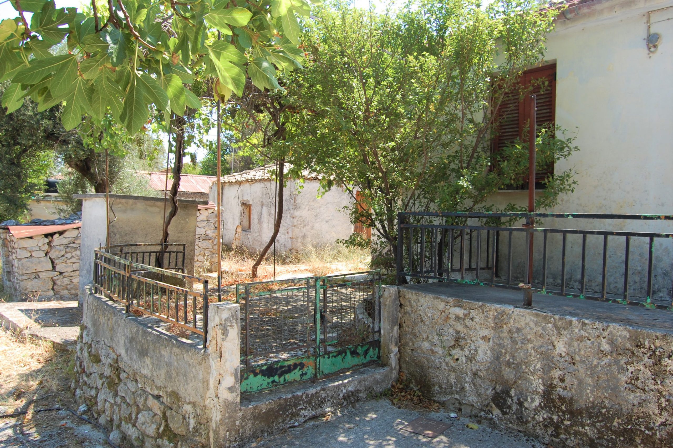 Gated entrance of house for sale in Ithaca Greece, Perachori