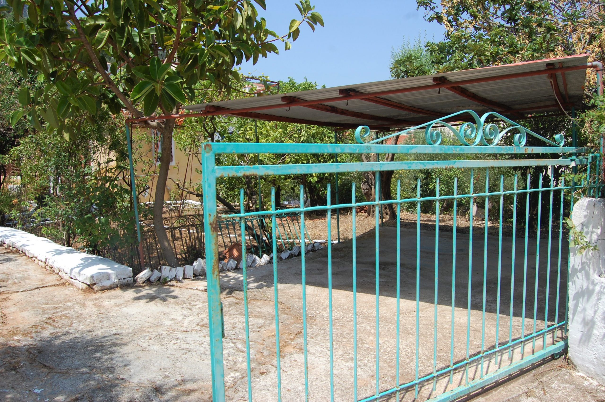 Gated entrance of house for sale in Ithaca Greece, Vathi