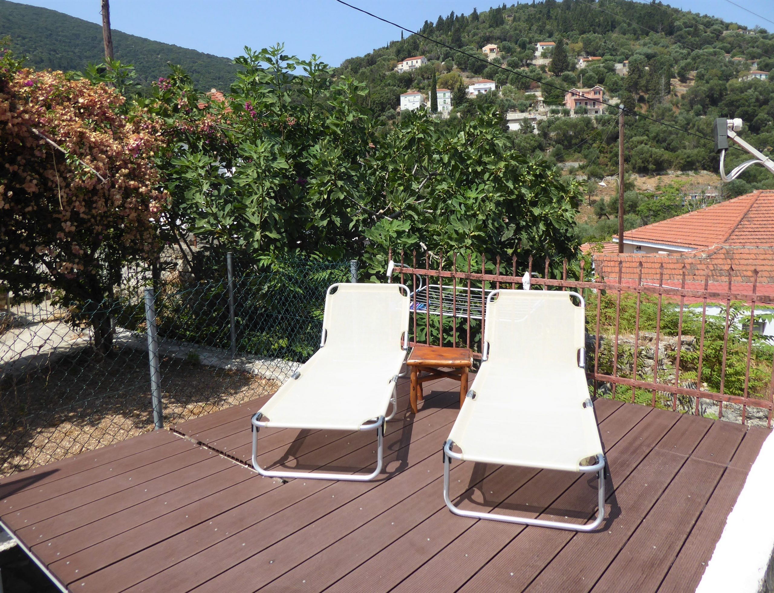 Wooden terrace of apartments for sale in Ithaca Greece, Kioni