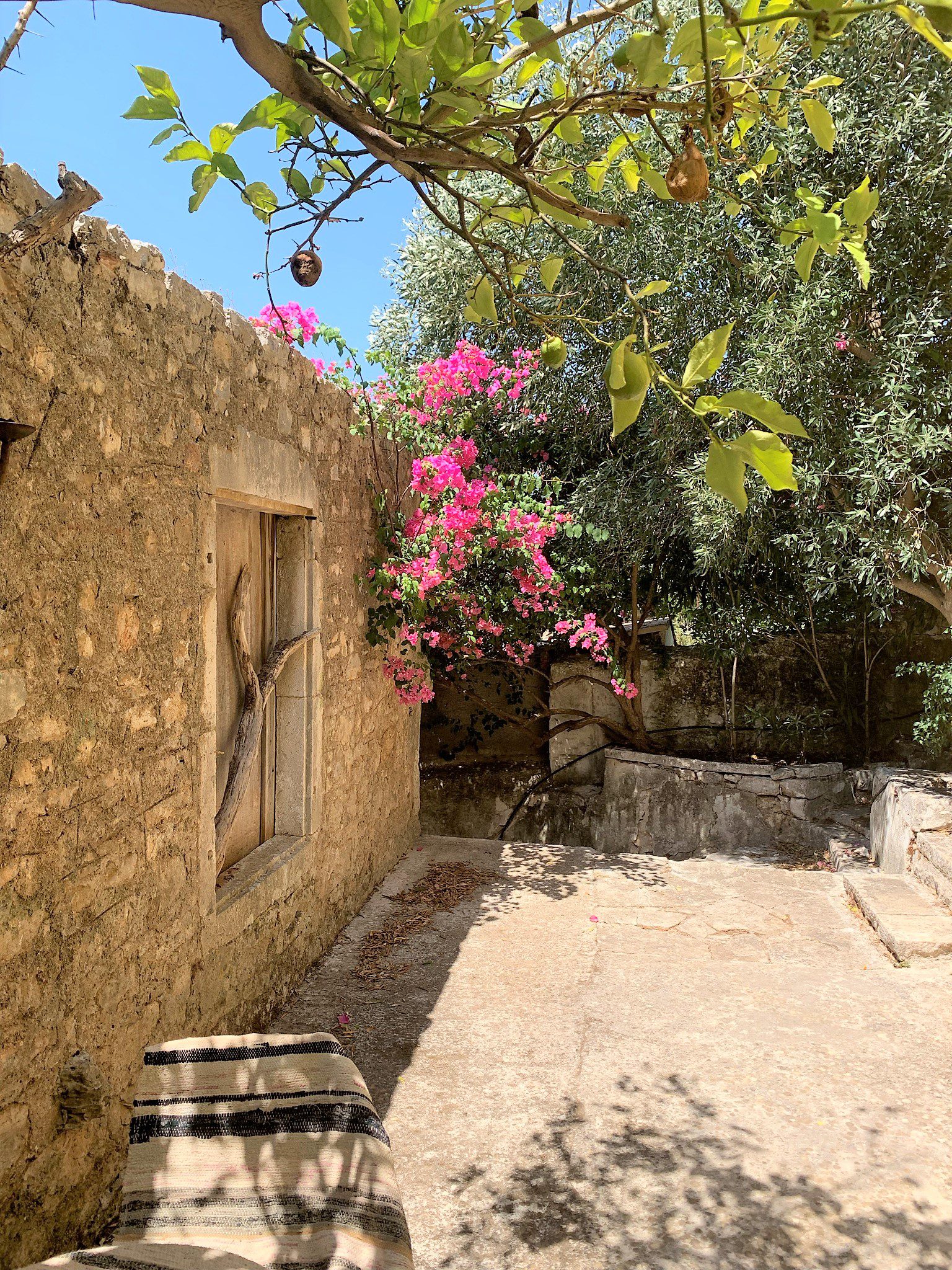 Exterior facade and terrace of ruin for sale in Ithaca Greece, Vathi