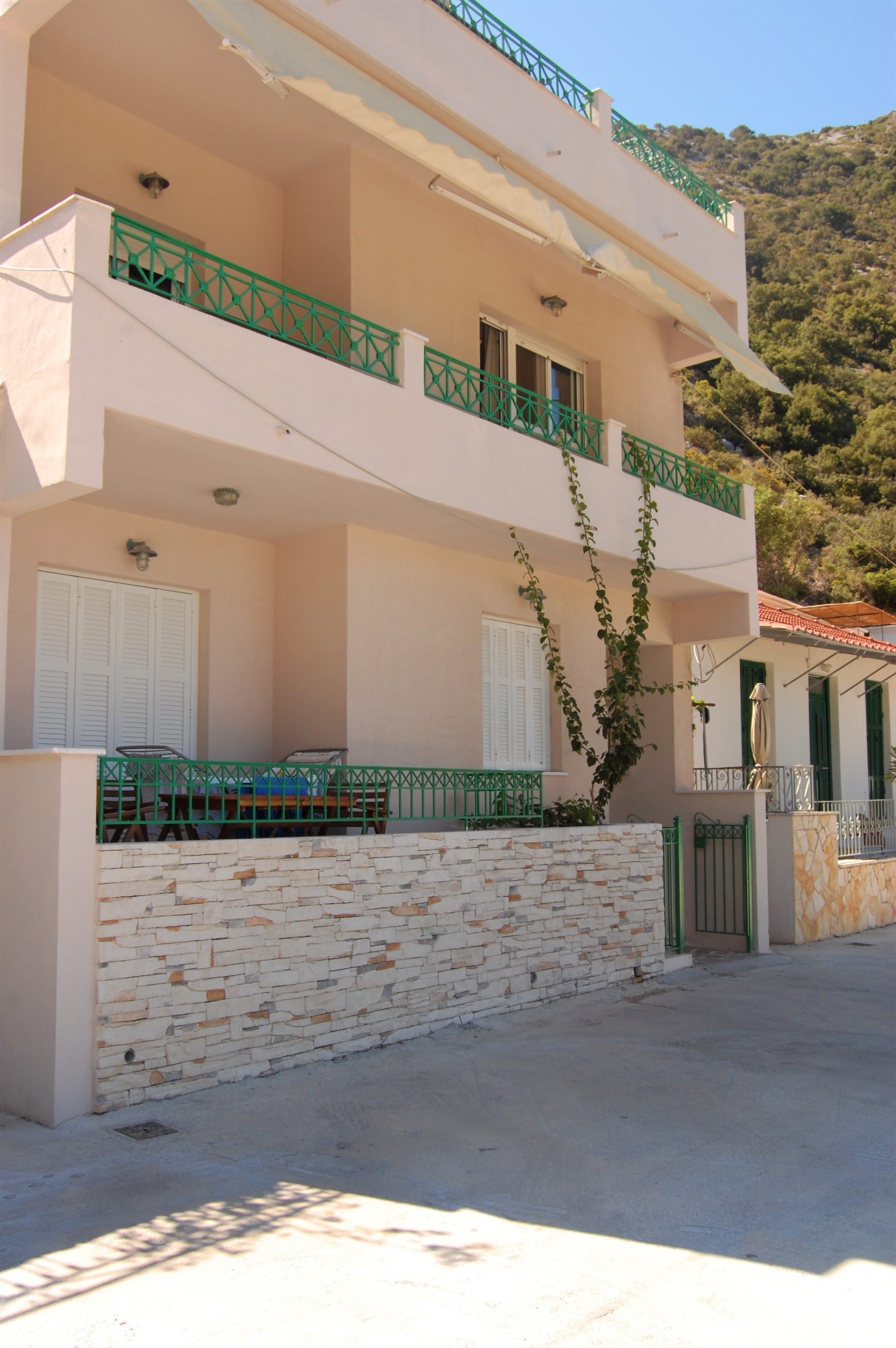 Exterior facade and balcony of apartment for rent in Ithaca Greece, Frikes