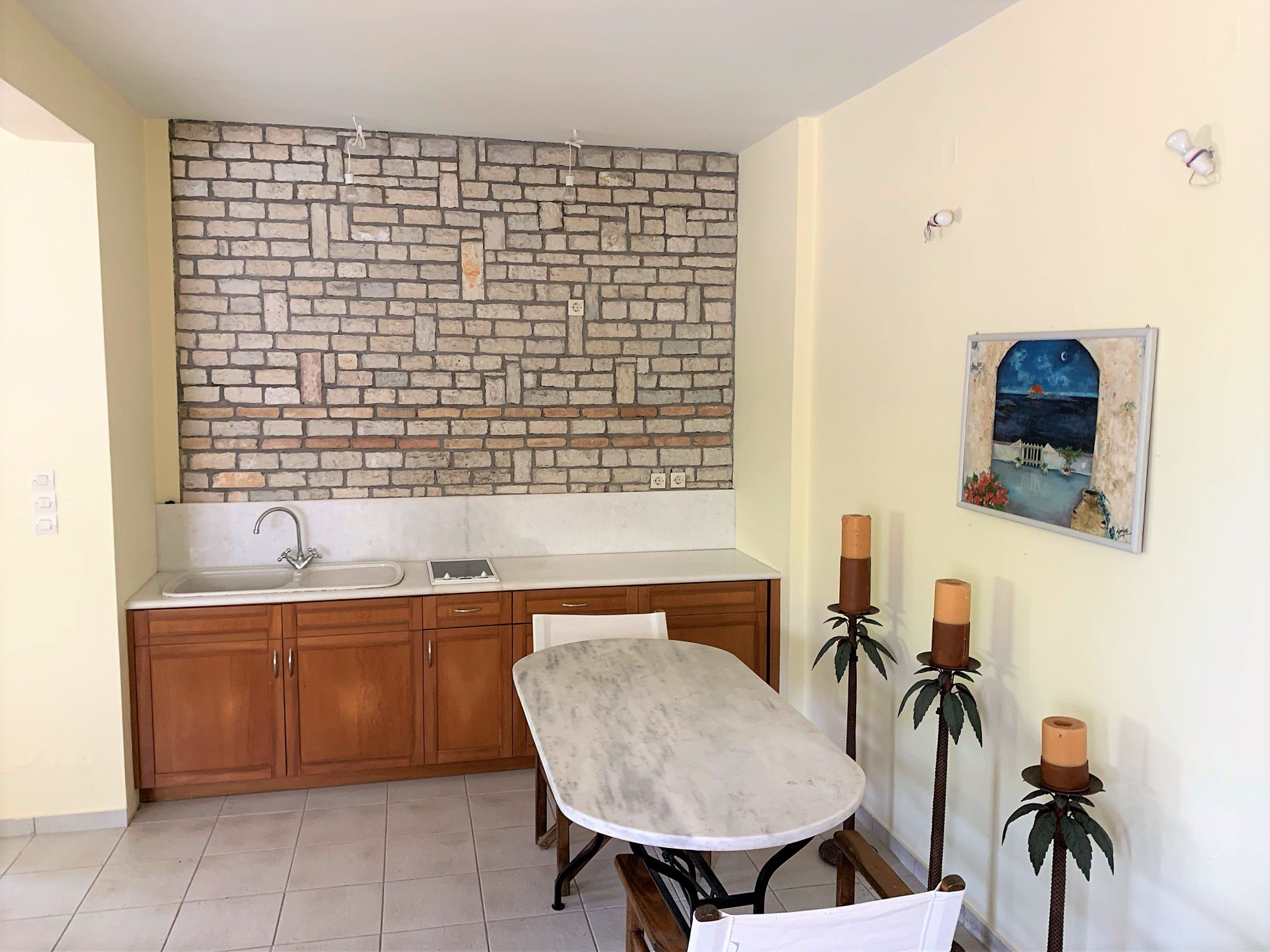 Kitchen area of studio below of house for sale Ithaca Greece, Aetos