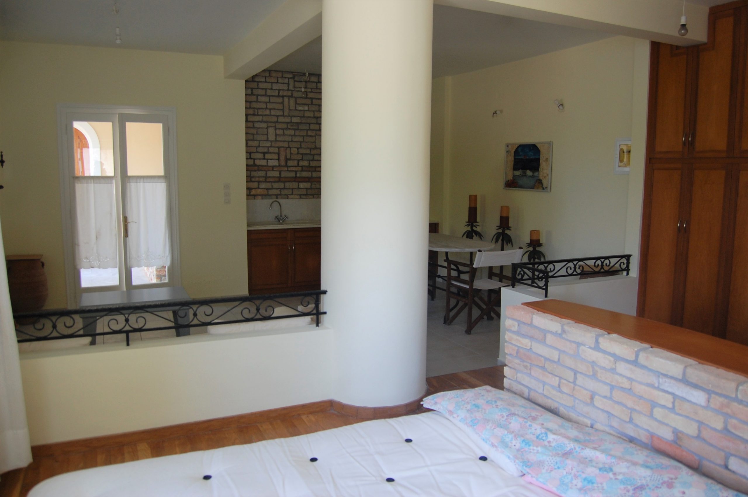Living room of studio below the house for sale Ithaca Greece, Aetos