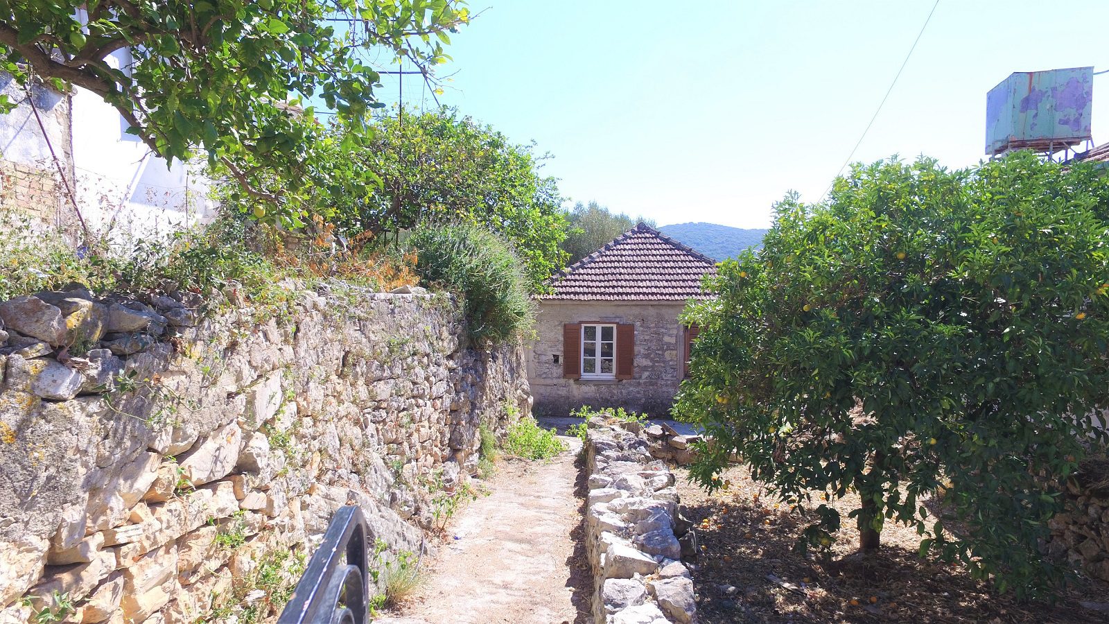 Distant view of house for sale Ithaca Greece, Vathi
