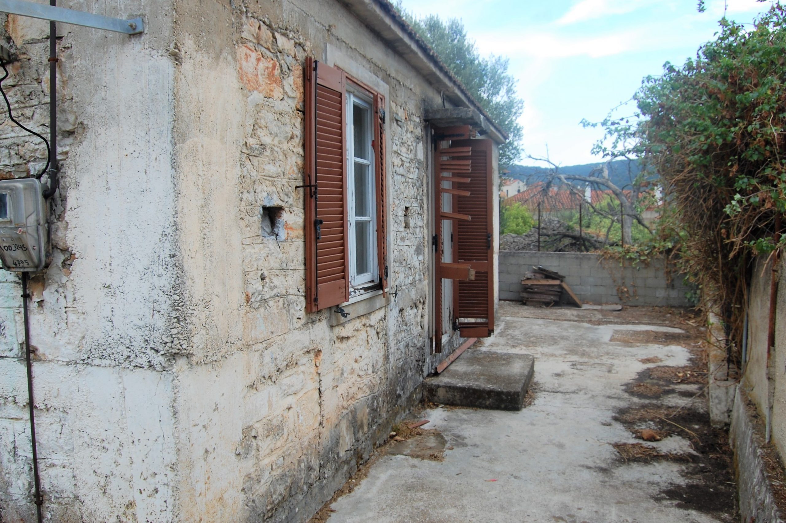 Side exterior of house for sale Ithaca Greece, Vathi