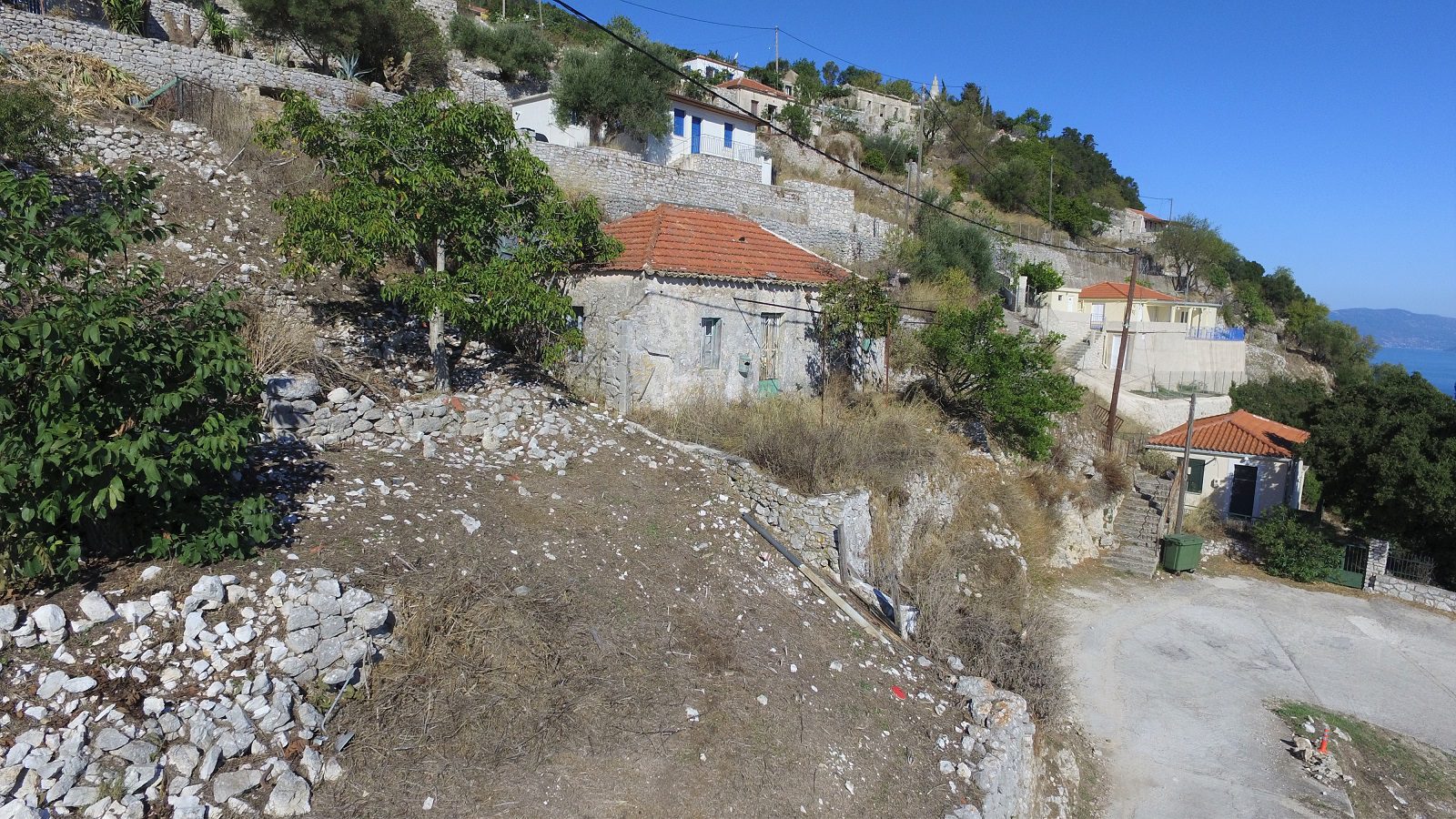 View from distance of house for sale Ithaca Greece, Exoghi