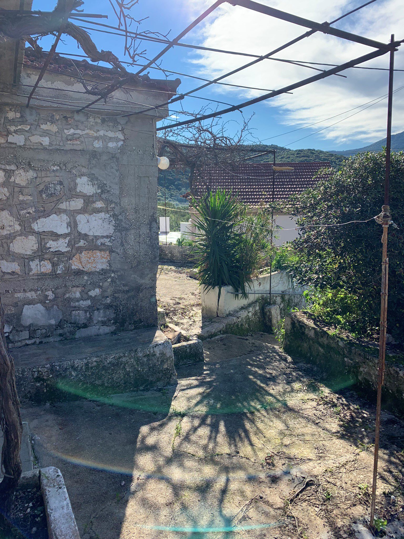 Side spaces of house for sale on Ithaca Greece, Vathi