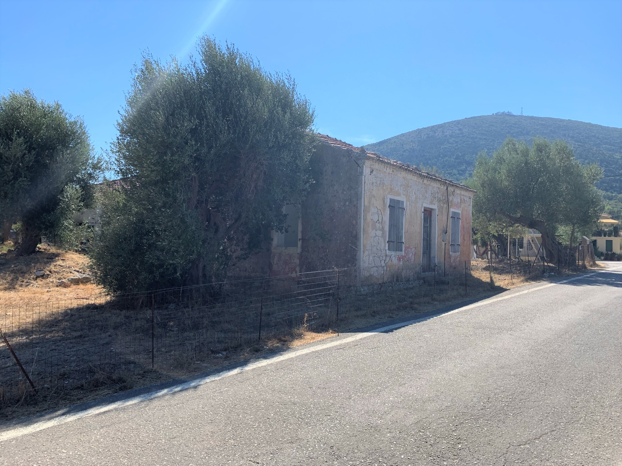Exterior of house for sale on Ithaca Greece, Lahos