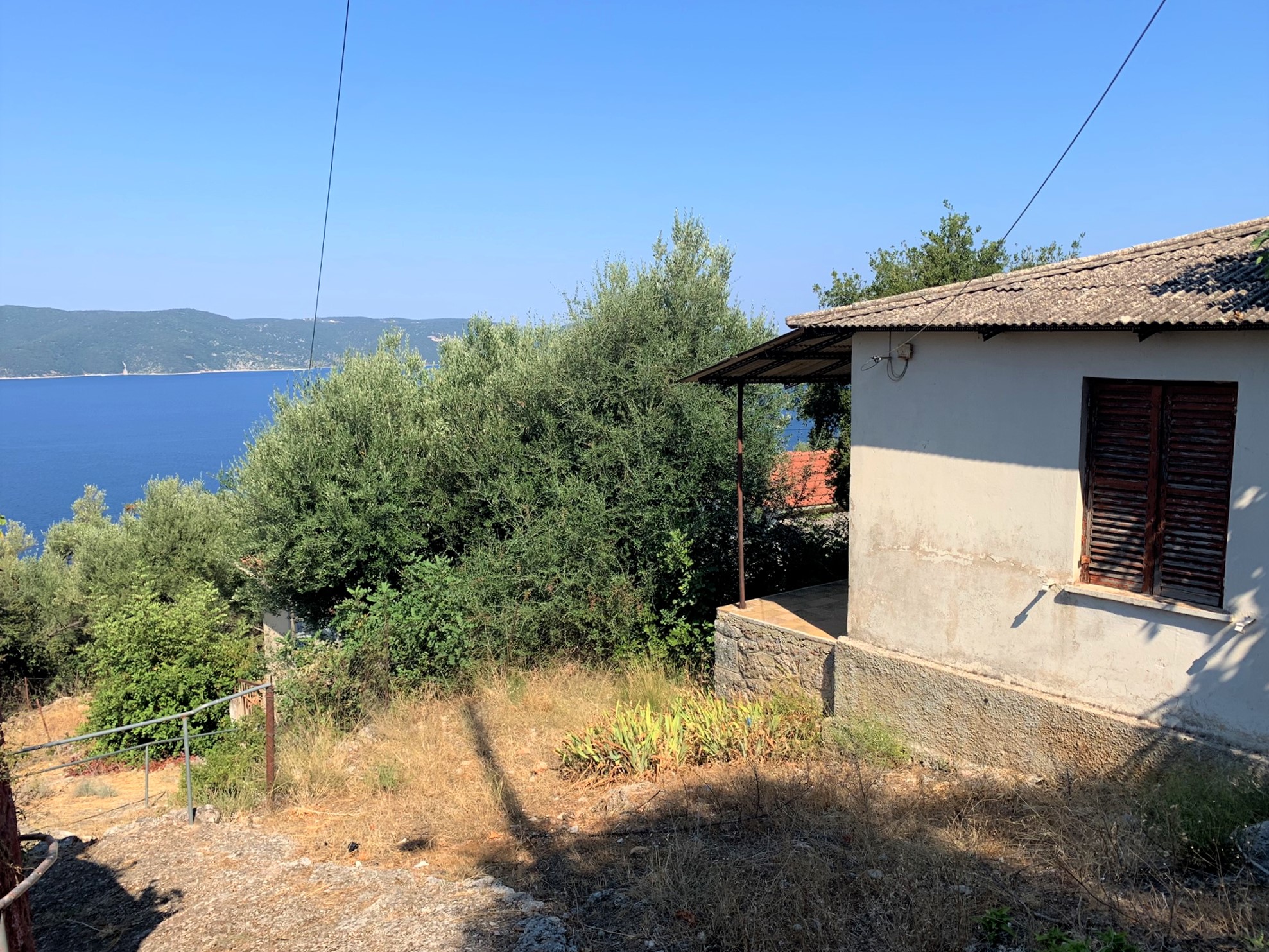 Exterior of house for sale on Ithaca Greece, Lefki