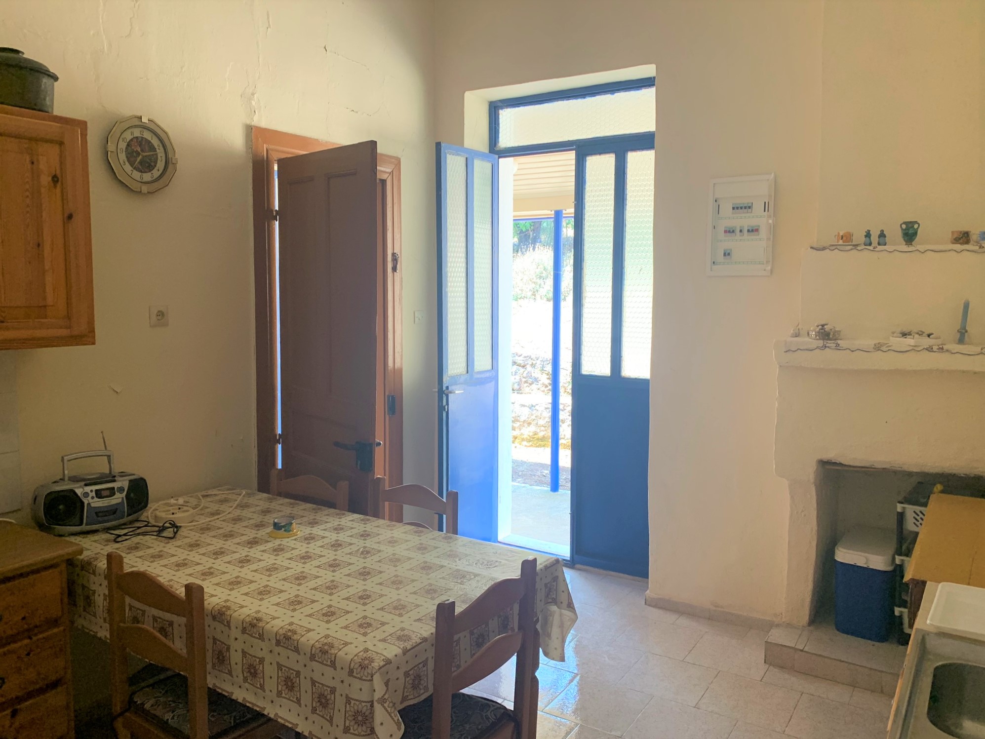 Entrance area and kitchen of house for sale on Ithaca, Greece, Anoghi