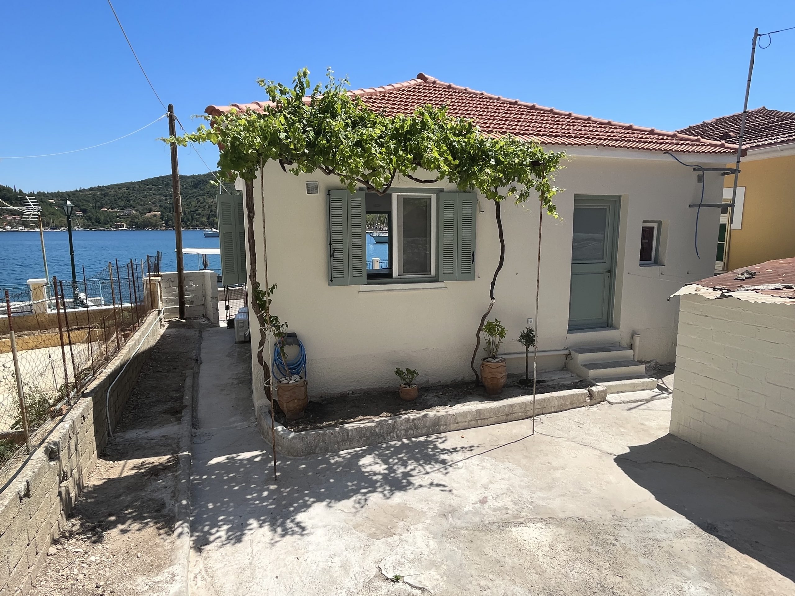 Back outdoor space of house for rent Ithaca Greece, Vathi
