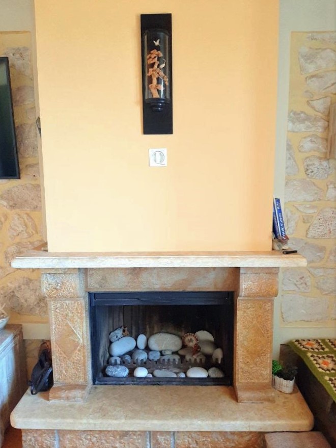 Fireplace of house for rent on Ithaca Greece, Anoghi