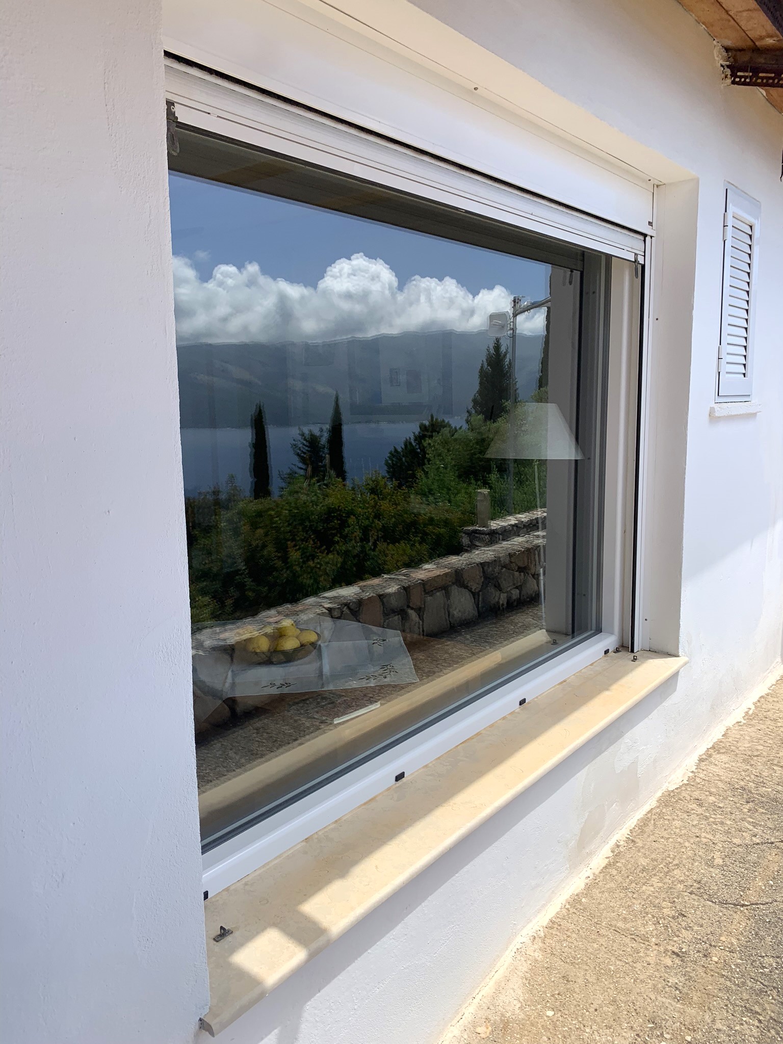 Exterior of house for sale on Ithaca Greece, Lefki