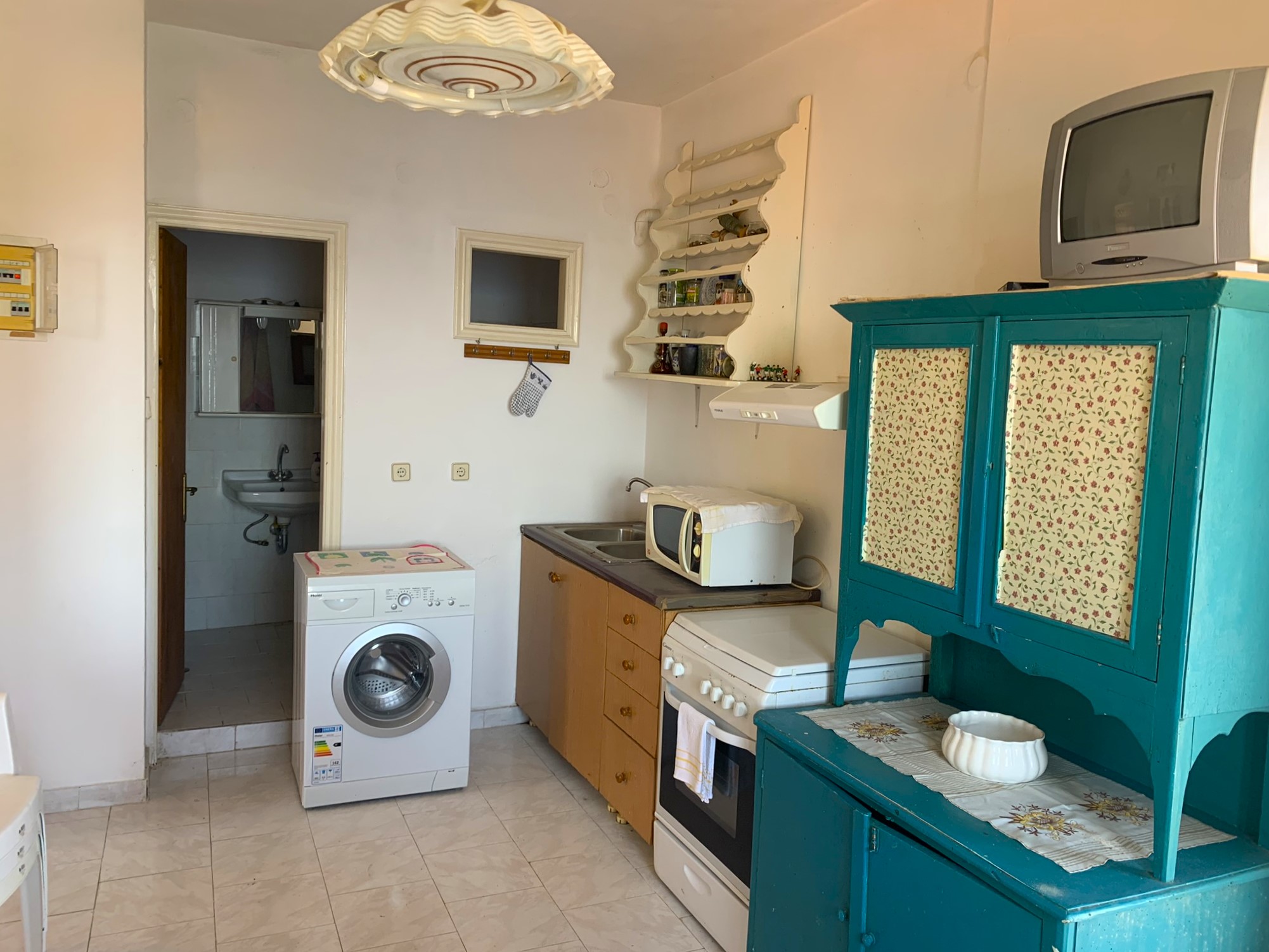 Kitchen area of house for sale on Ithaca Greece, Kioni