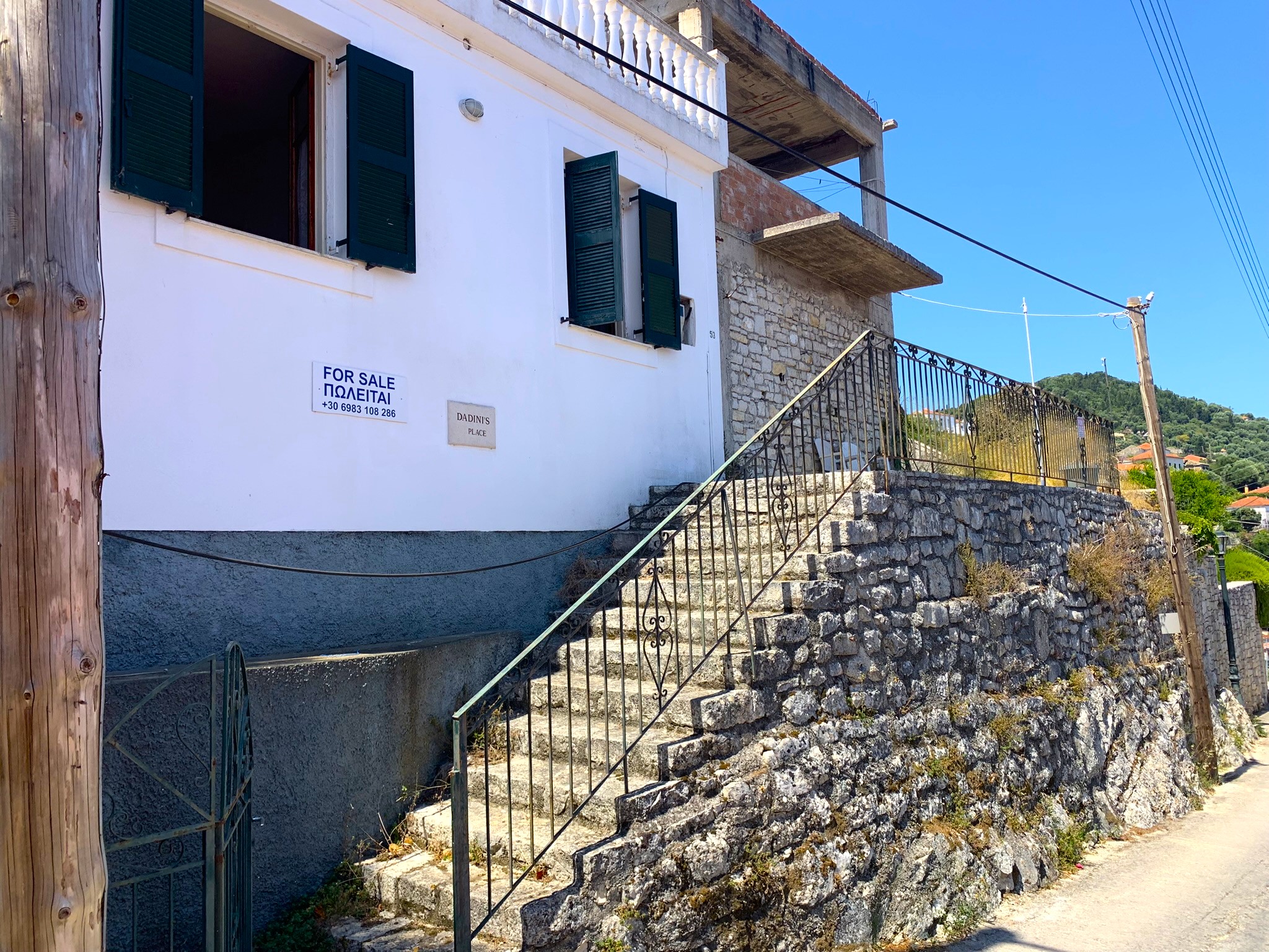 Exterior of house for sale on Ithaca Greece, Kioni