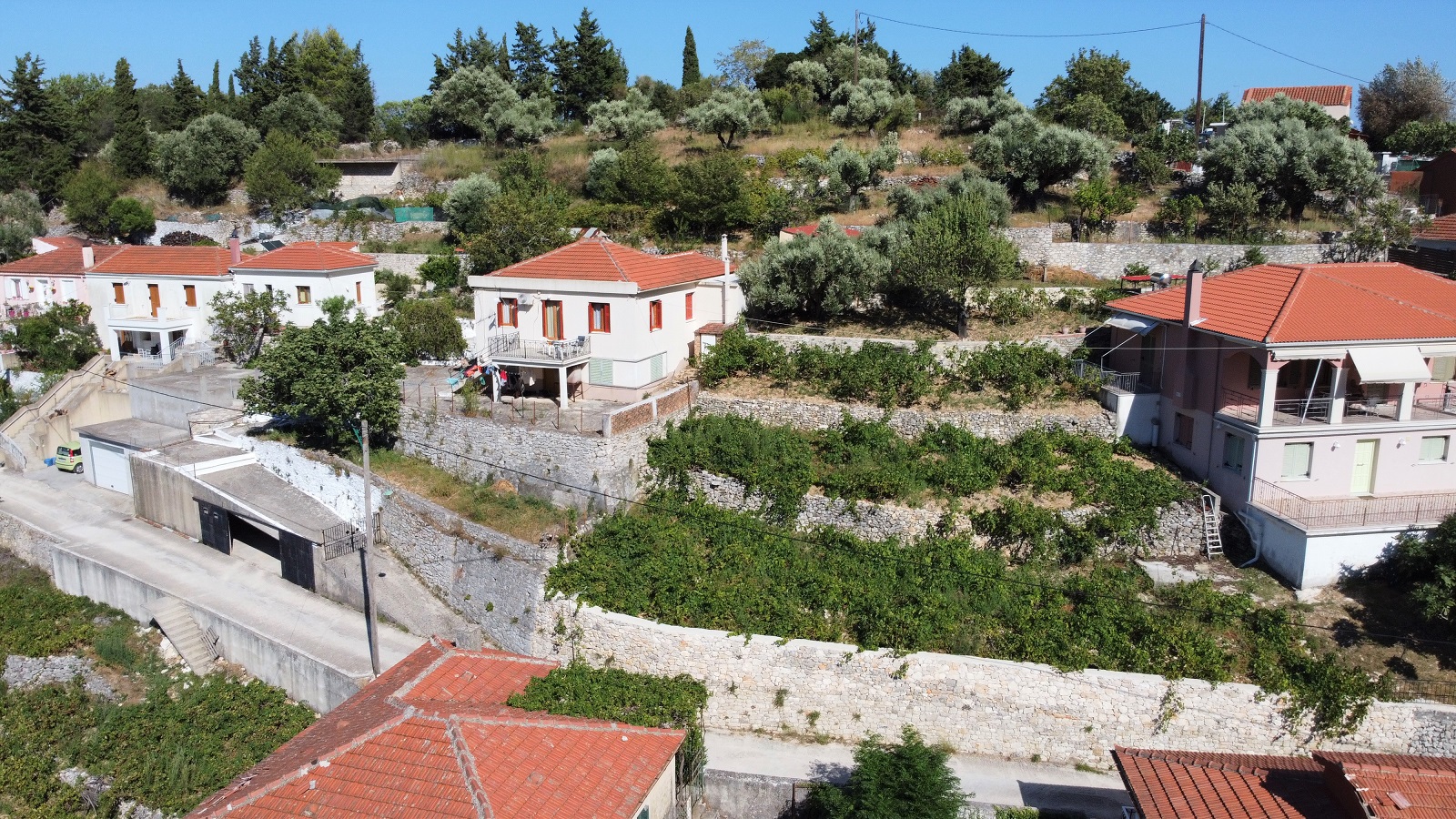 Aerial view of house and land for sale on Ithaca, Greece, Perachori