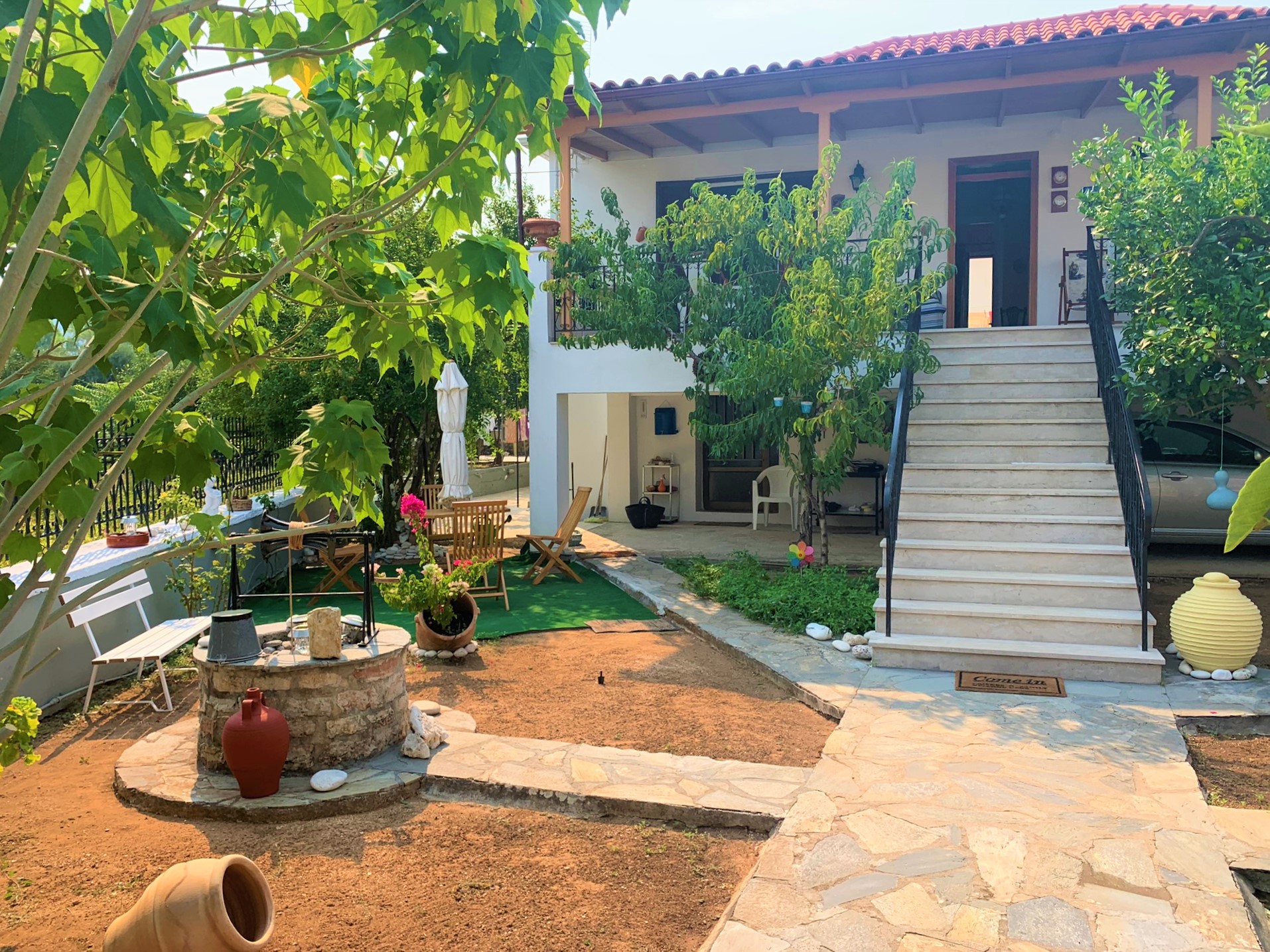 Patio and main entrance of house for sale on Ithaca Greece, Vathi