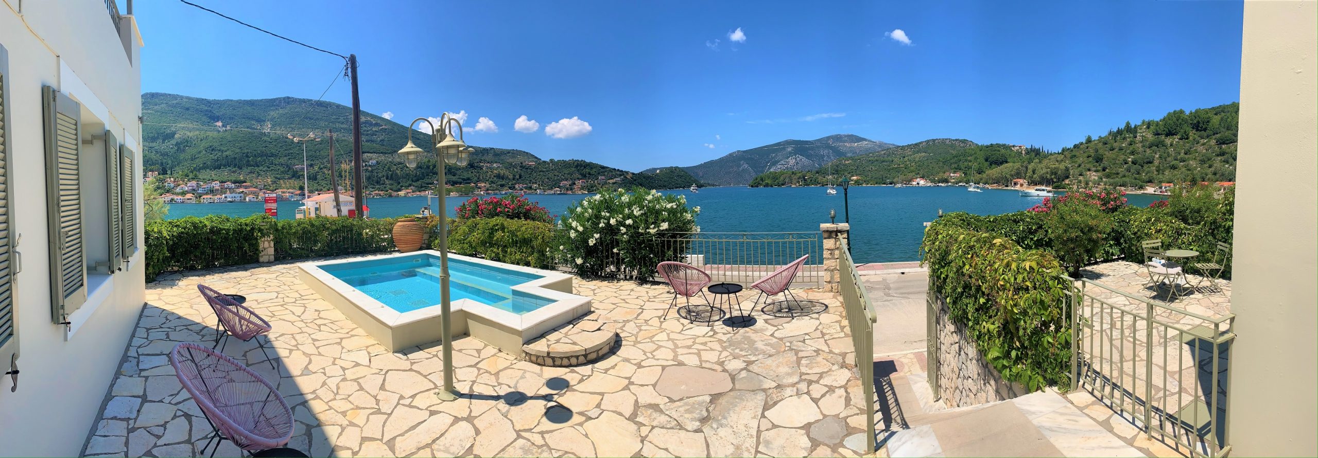 Panoramic view of pool area of hotel for sale on Ithaca Greece, Vathi