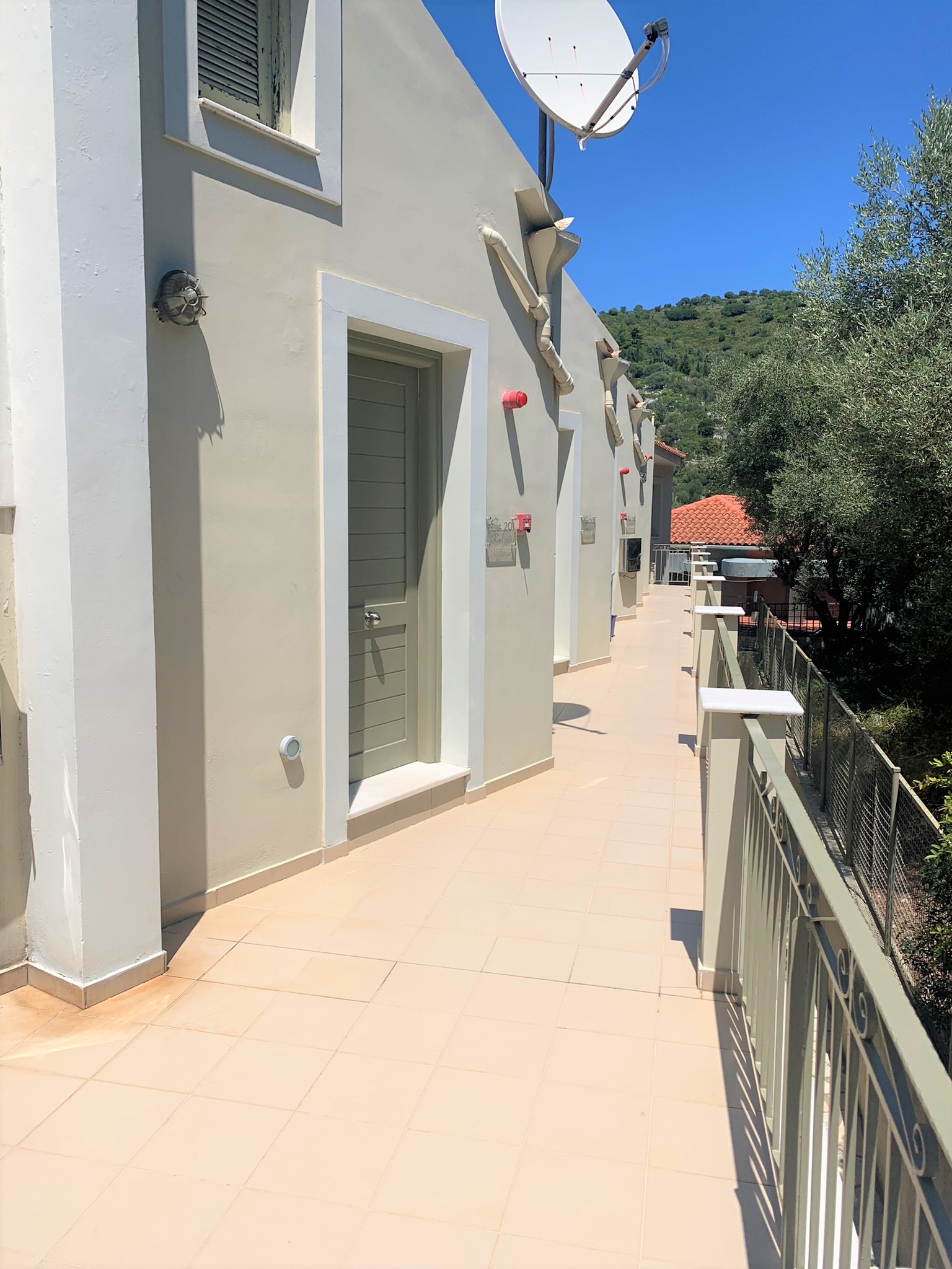 Back exterior of hotel for sale on Ithaca Greece, Vathi