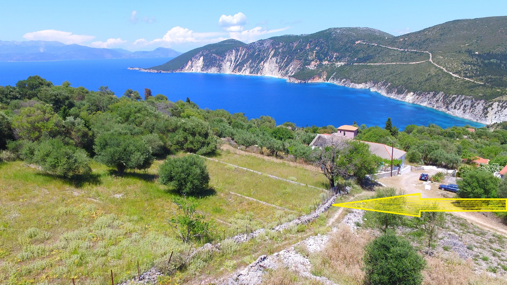 Aerial view and location of land with building license for sale on Ithaca Greece, Kolleri
