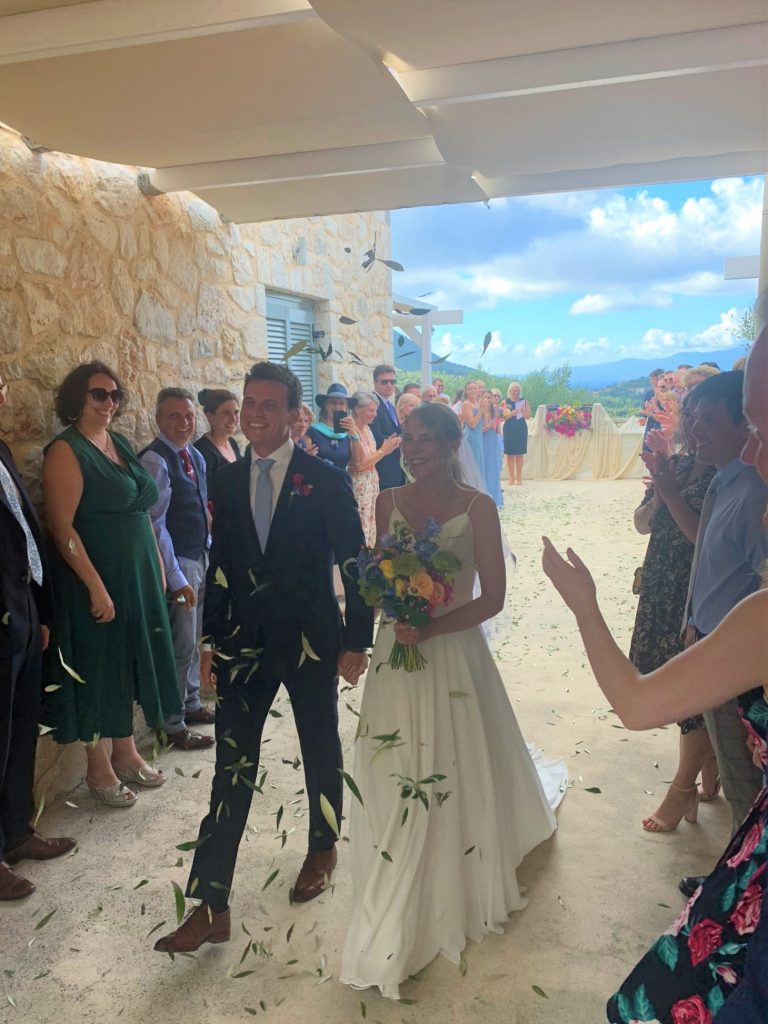 Bride and groom at wedding ceremony on Ithaca Greece