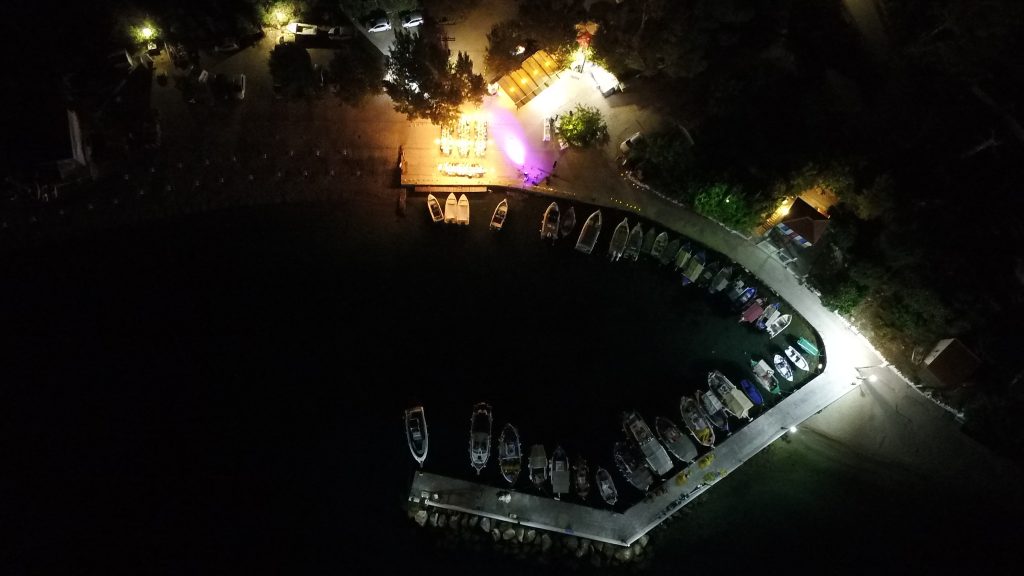 Drone pic of wedding reception on the sea shore, Ithaca Greece