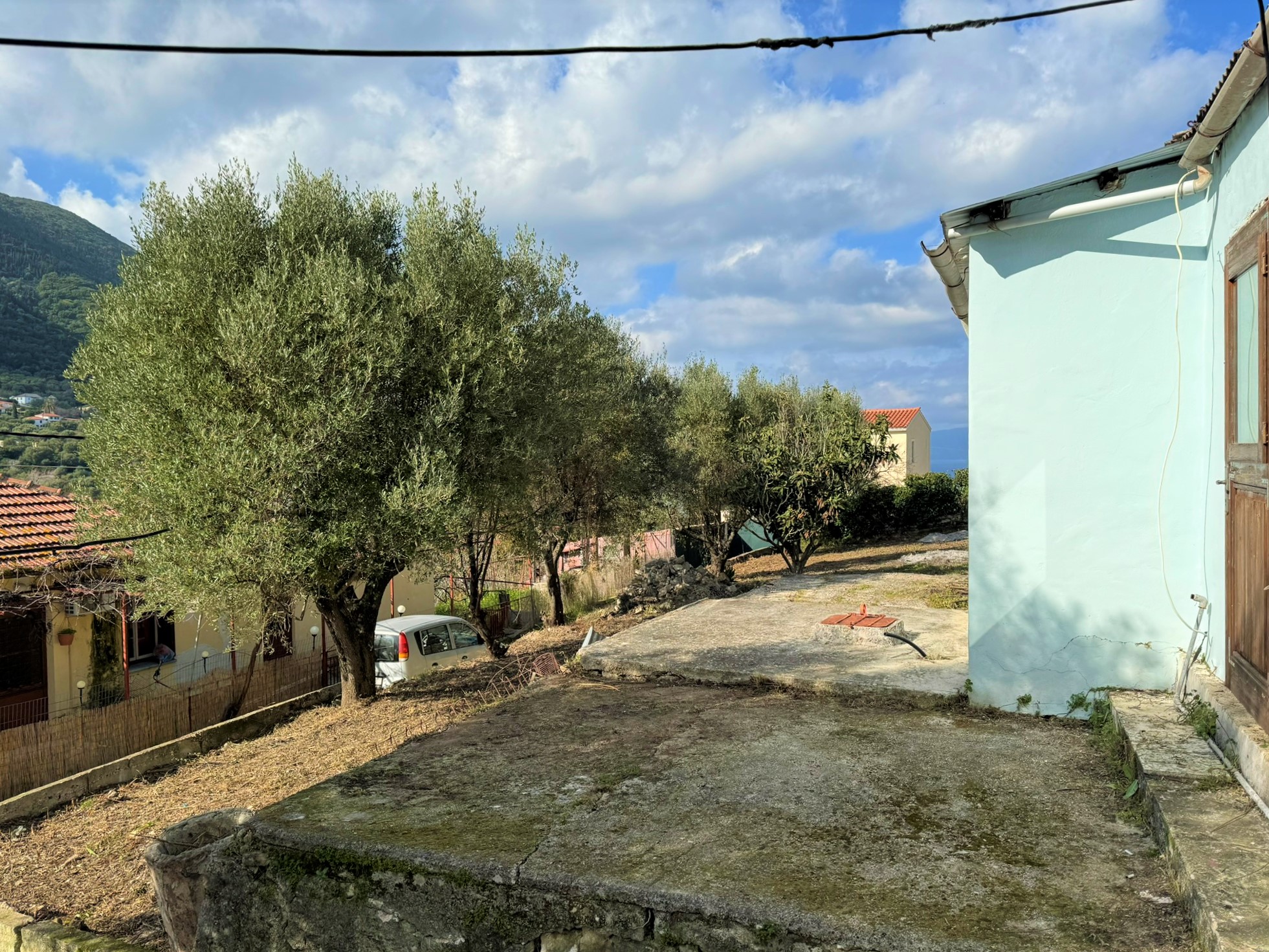 External wall and road view of house for sale in Ithaca Greece, Platrithya