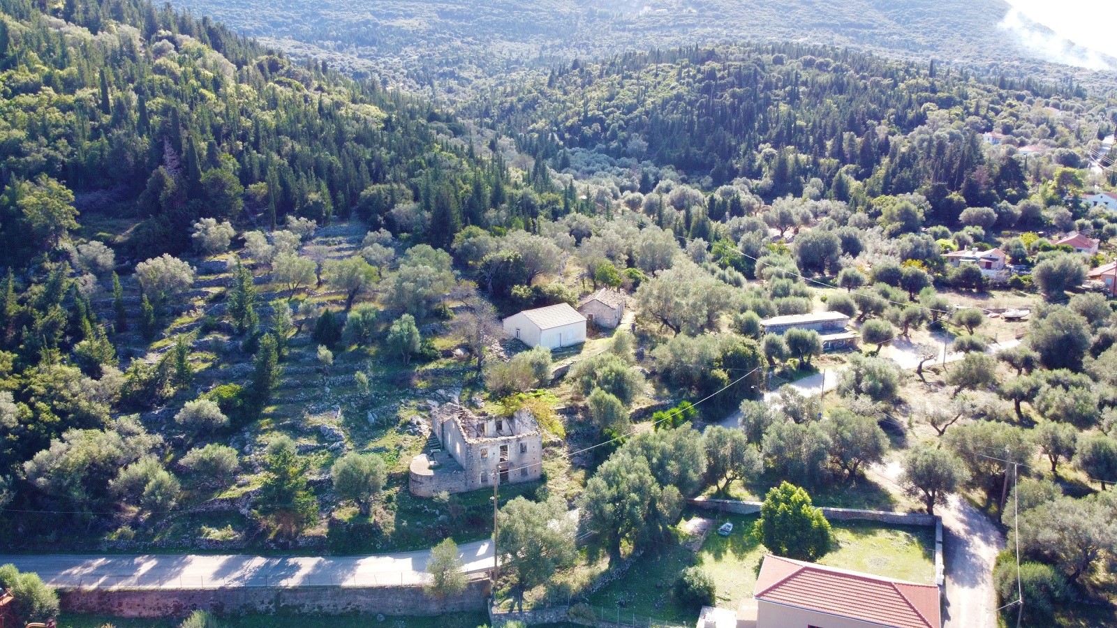 Aerial views of house with land for sale in Ithaca Greece Frikes