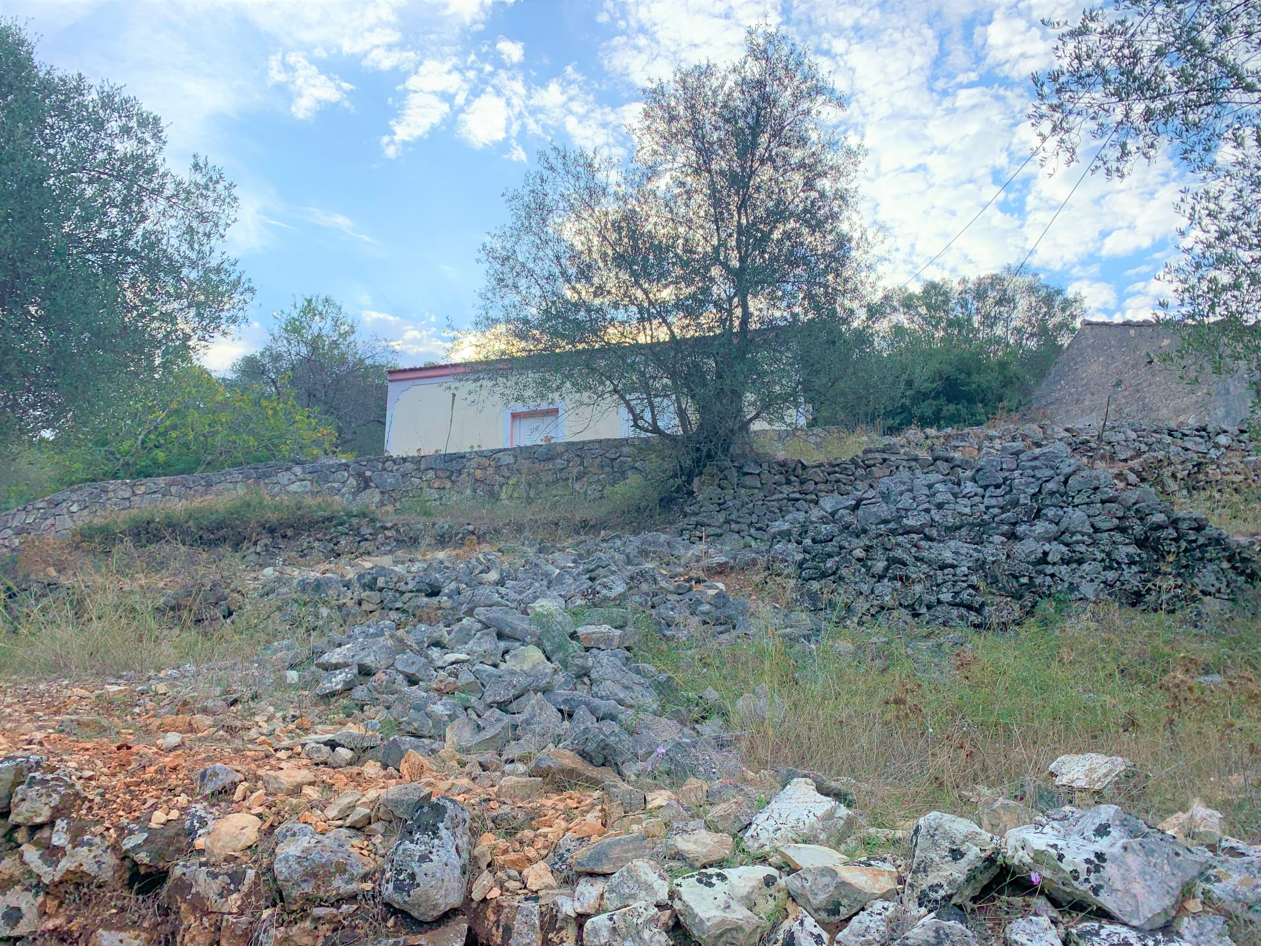 Exterior of house with land for sale in Ithaca Greece Frikes