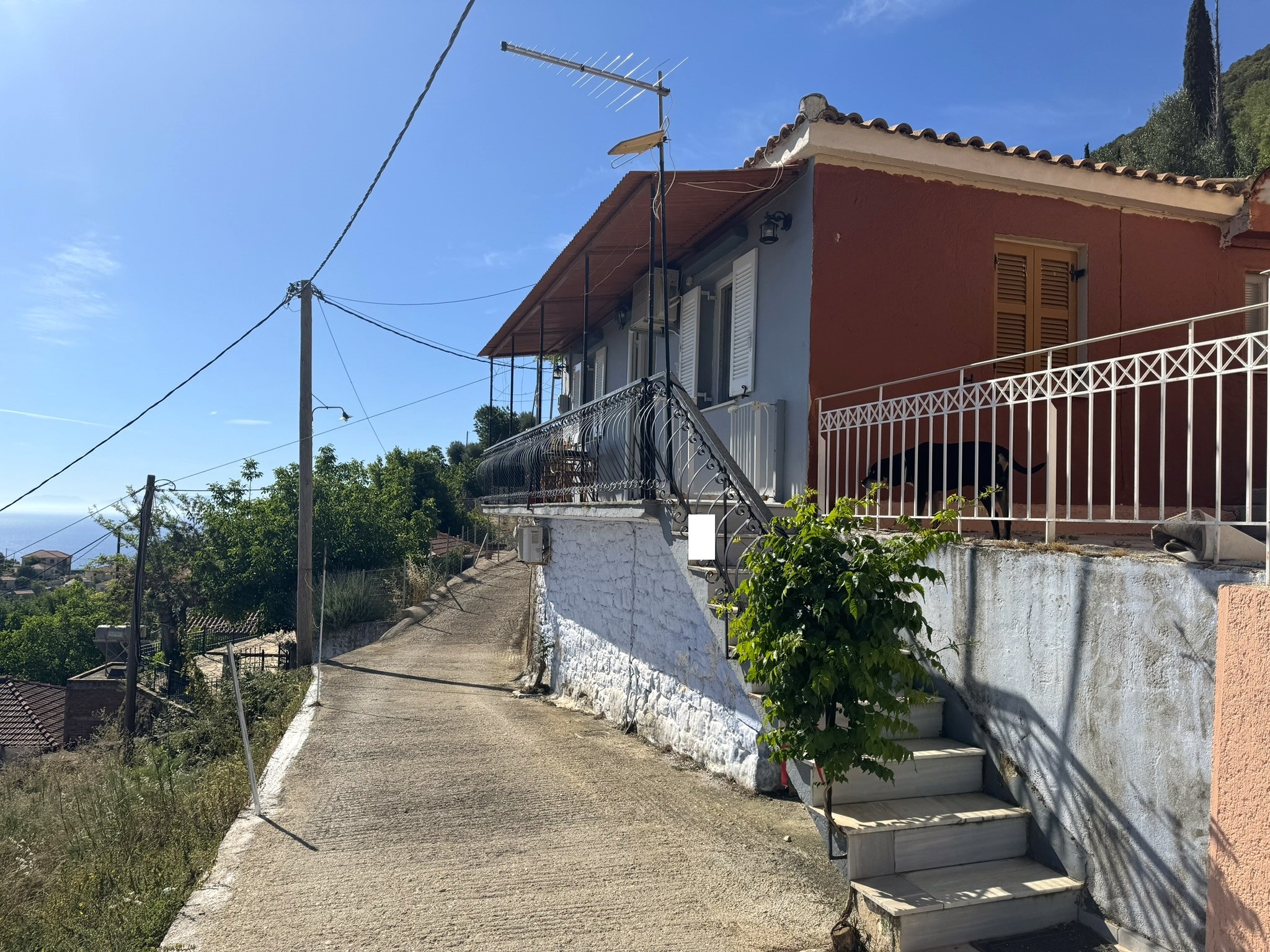 Access stairs from road of house for sale in Ithaca Greece Perachori