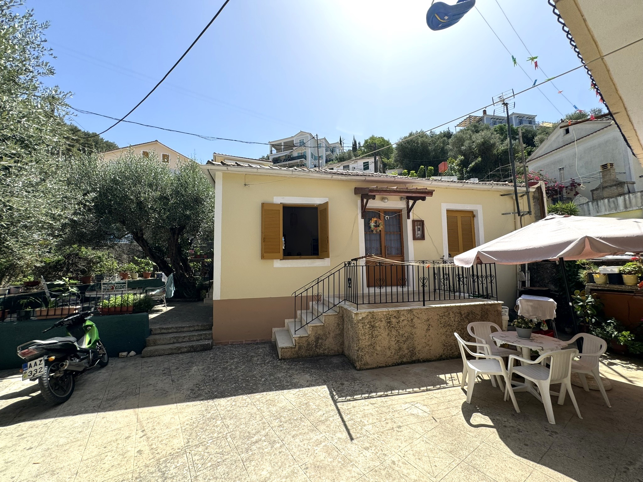 Outside area and front view of house for sale in Ithaca Greece Vathi