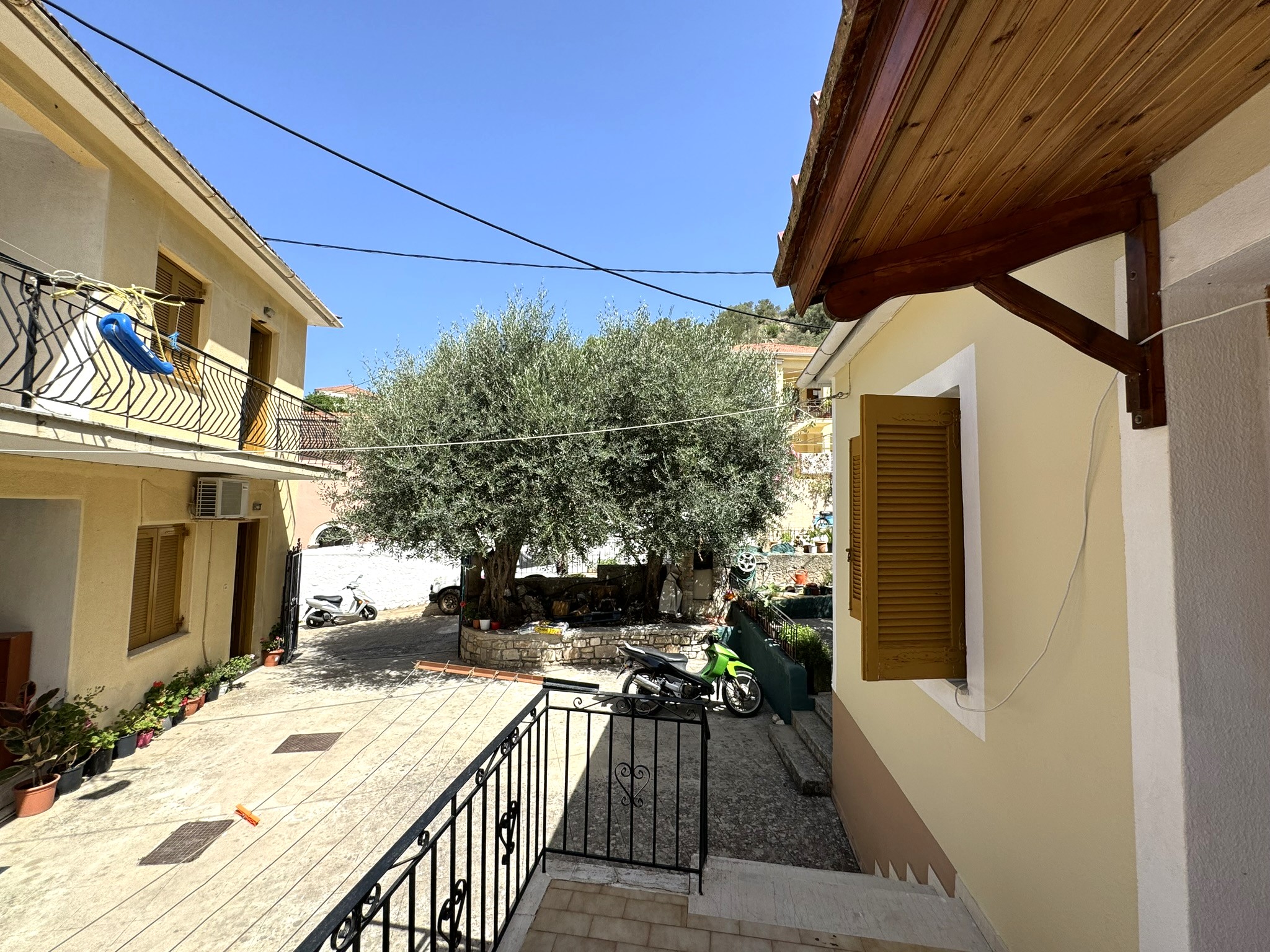 Balcony view and outside area of house for sale in Ithaca Greece Vathi