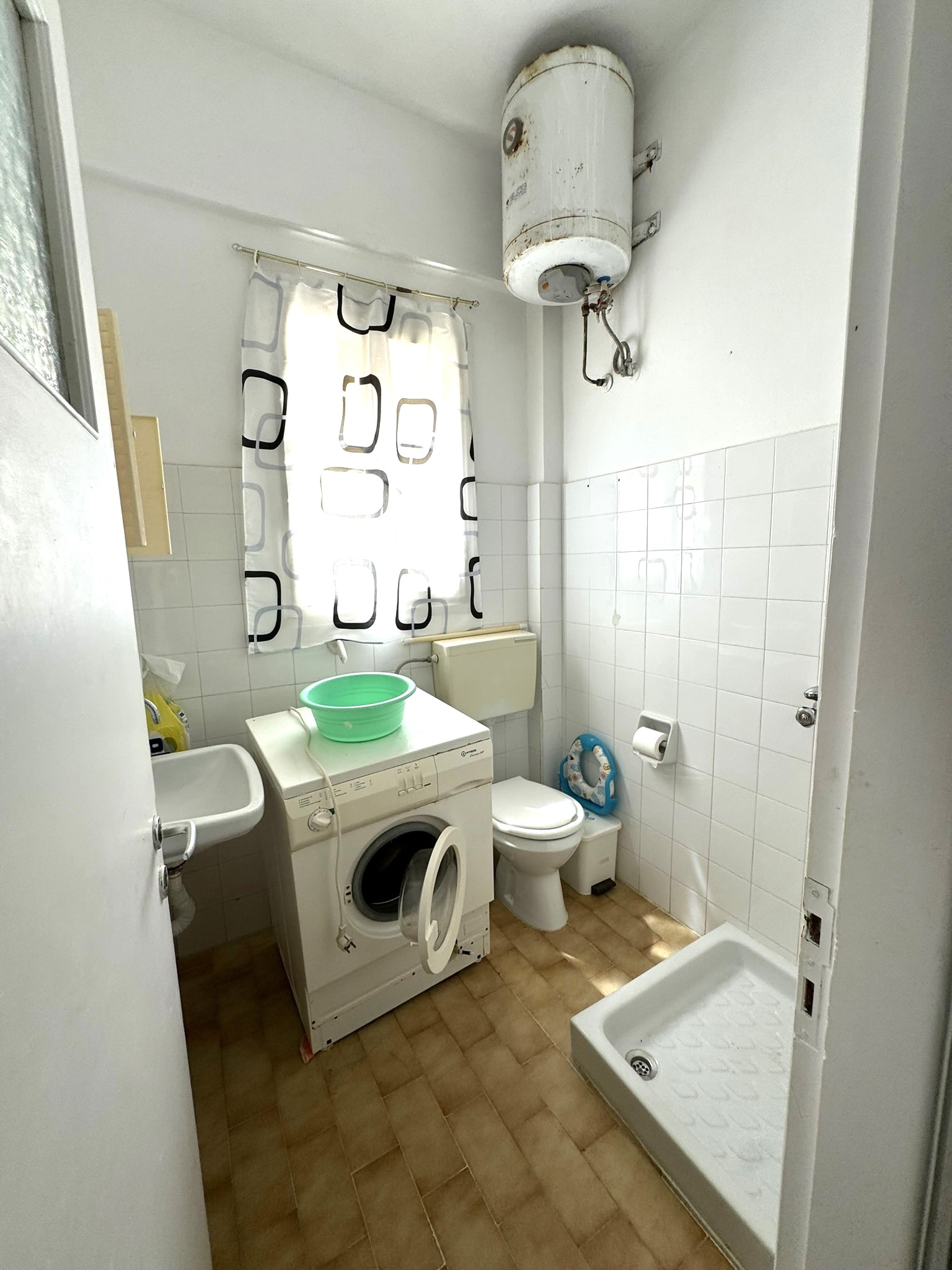 Bathroom of one apartment for sale in Ithaca Greece Vathi