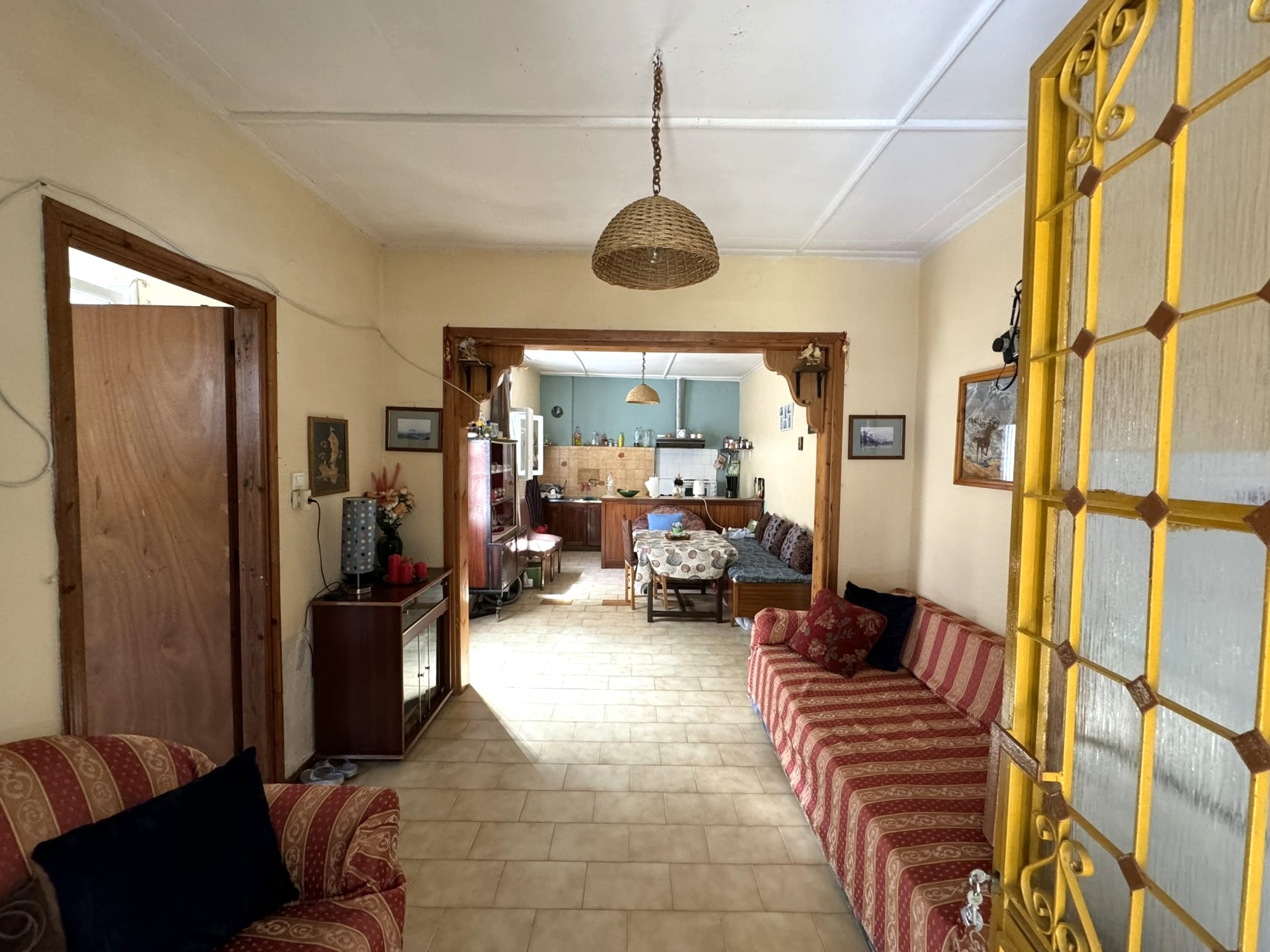 Passageway, living area and kitchen of house for sale in Ithaca Greece Vathi