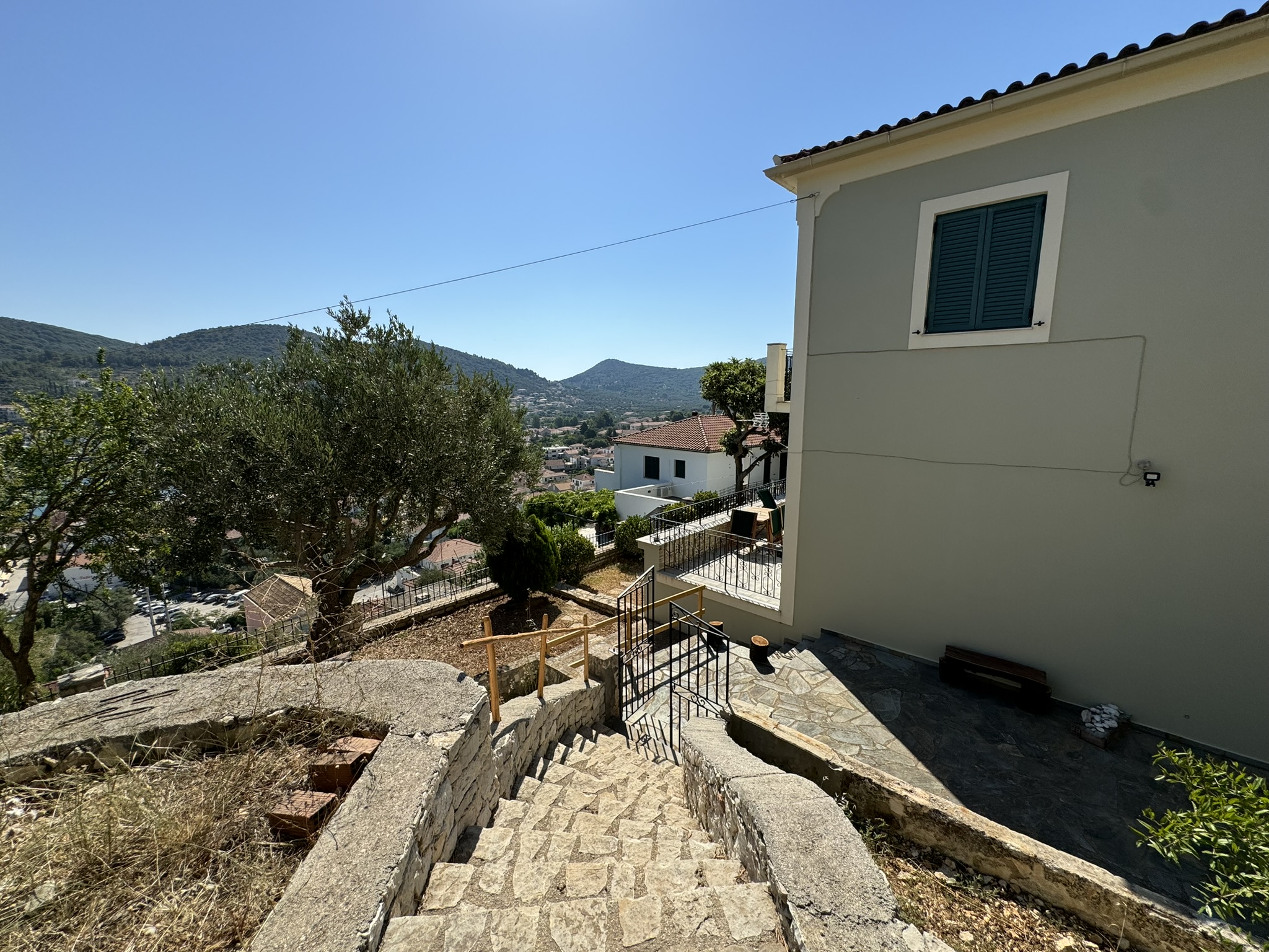 Outside stairs of house for sale in Ithaca Greece Vathi