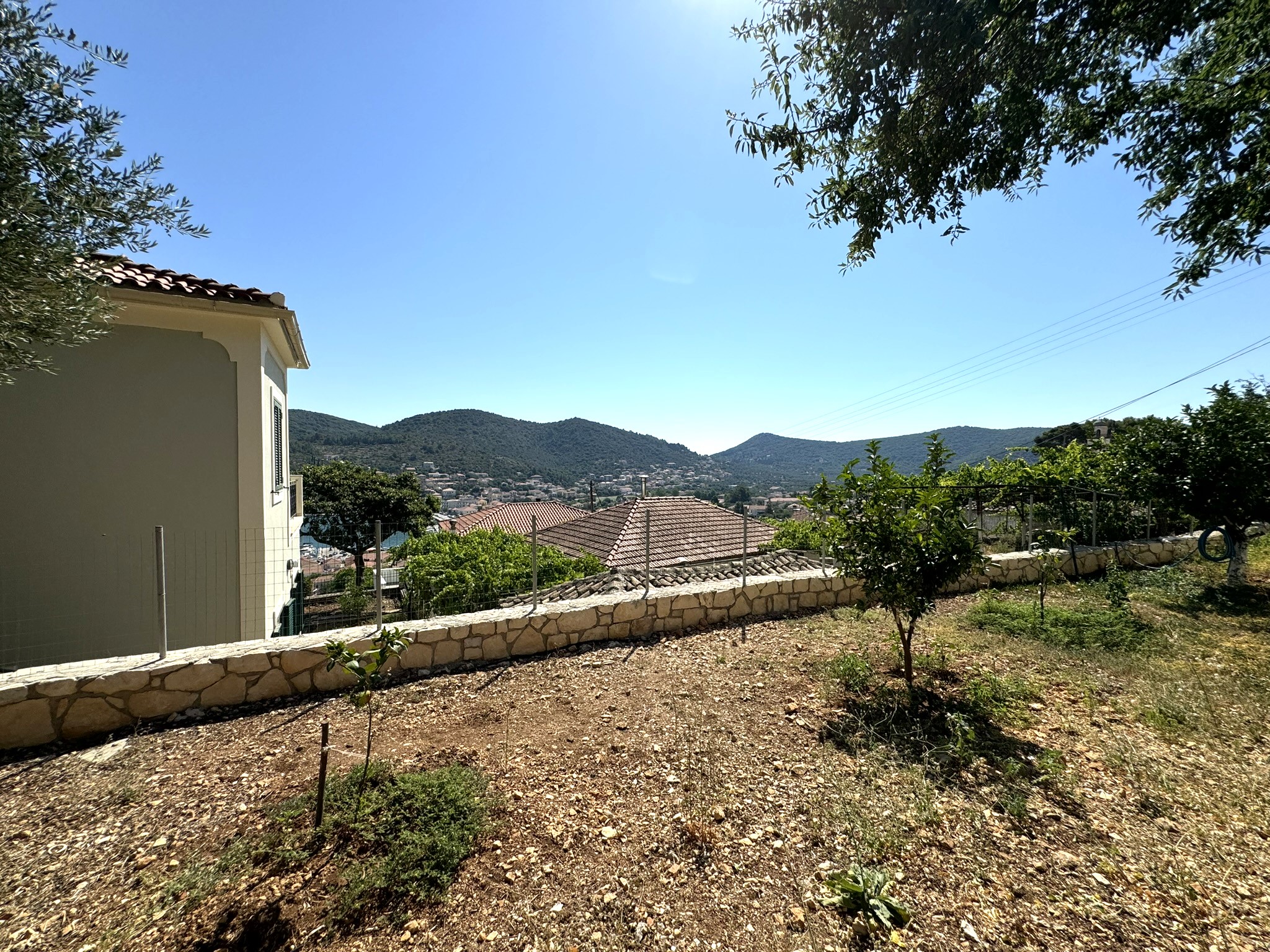 Outside area and views of house for sale in Ithaca Greece Vathi