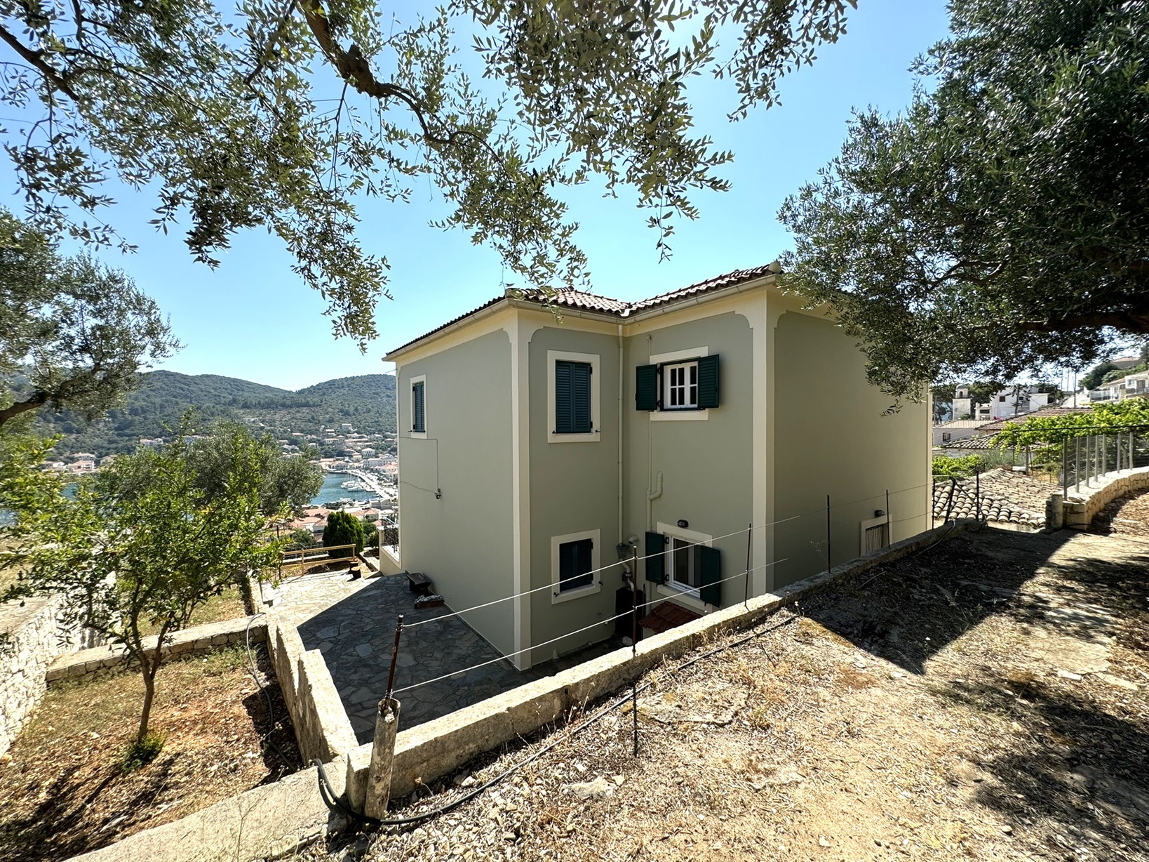 Outside area and back of house for sale in Ithaca Greece Vathi