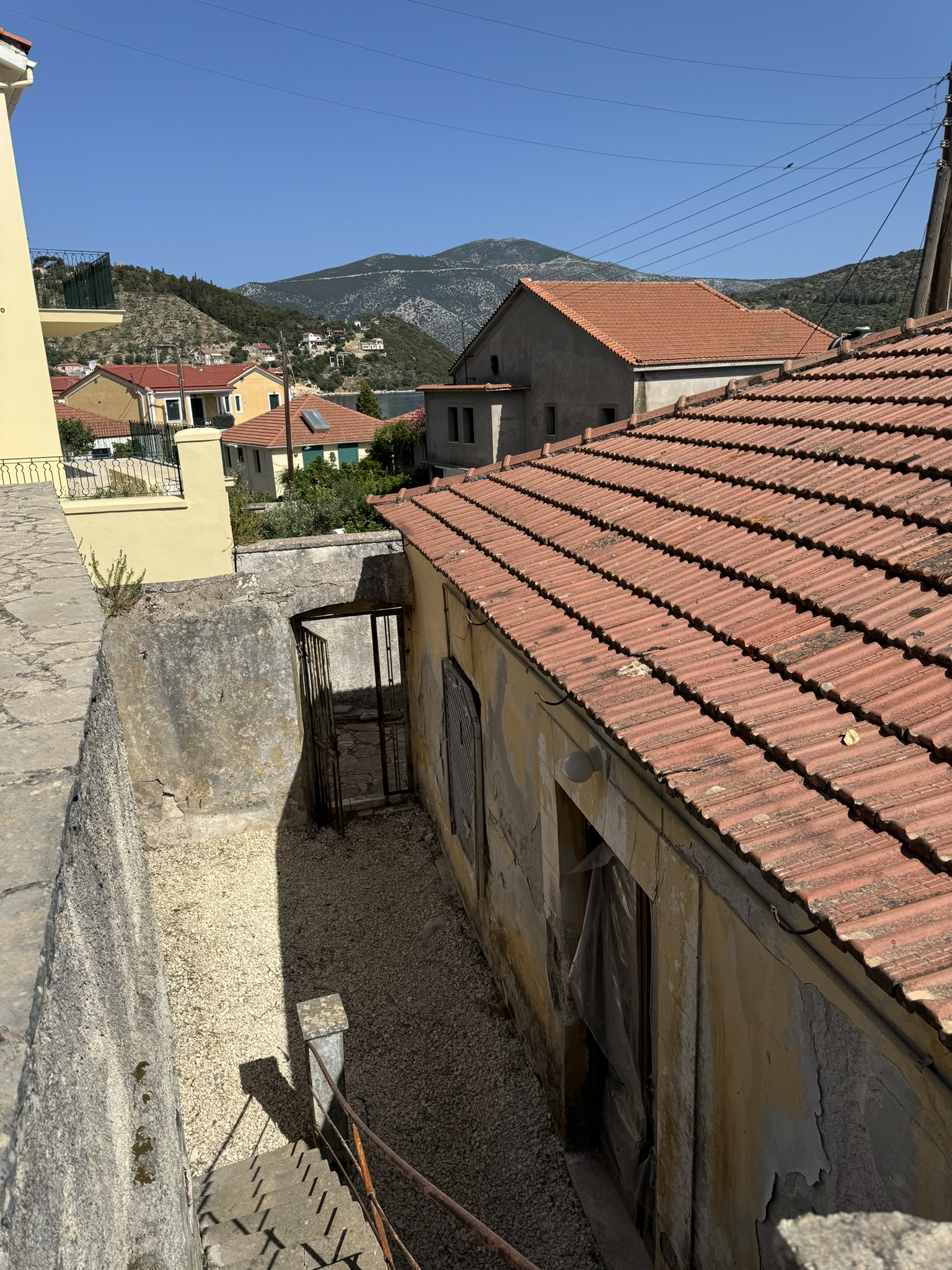 Back courtyard of house for sale in Ithaca Greece Vathi