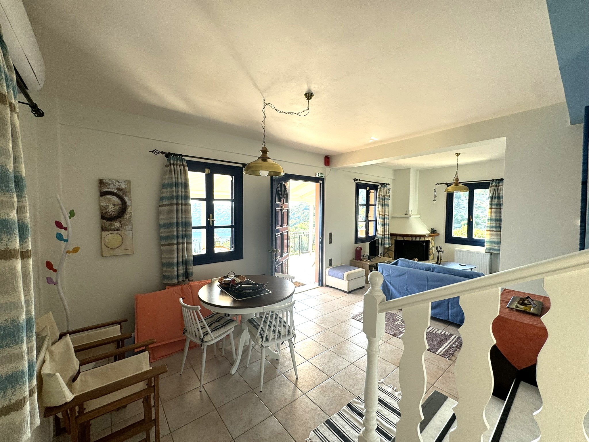 Dining and lounge area of house for sale in Ithaca Greece Kioni