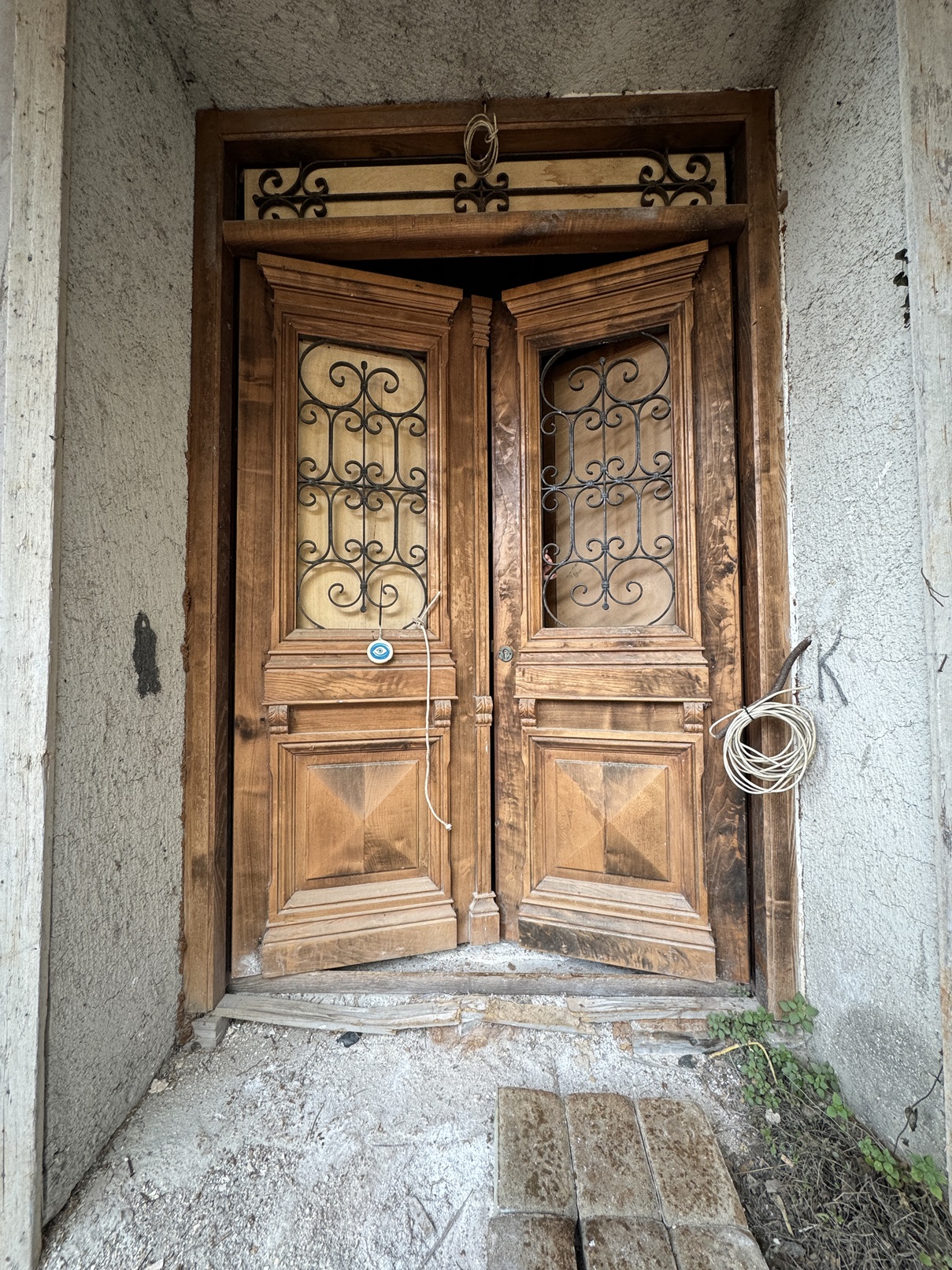 Front door of boutique hotel for sale in Ithaca Greece Vathi